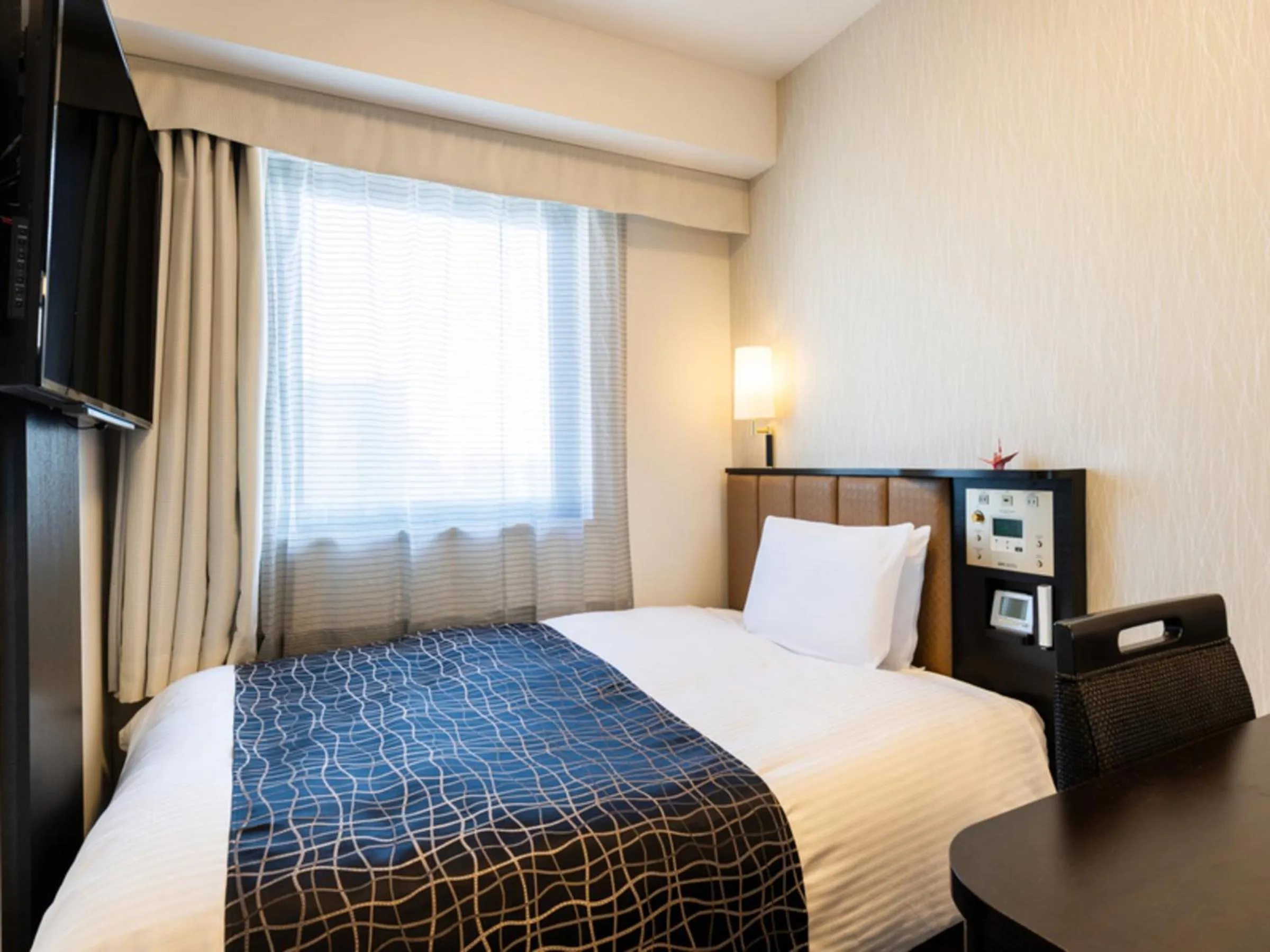 Photo of the whole room, Bed in APA Hotel Namba Ekihigashi