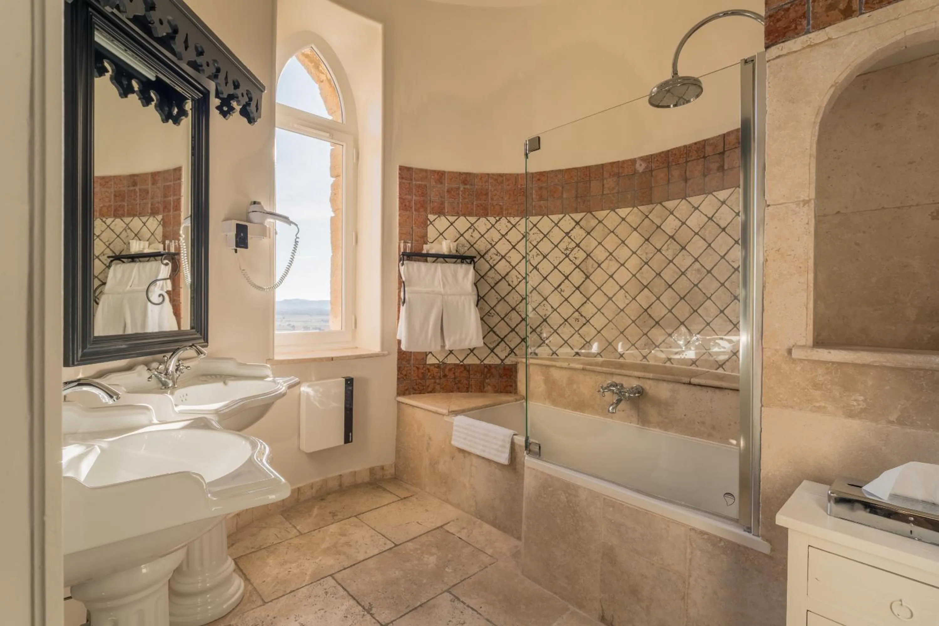 Bathroom in Hostellerie du Château des Fines Roches