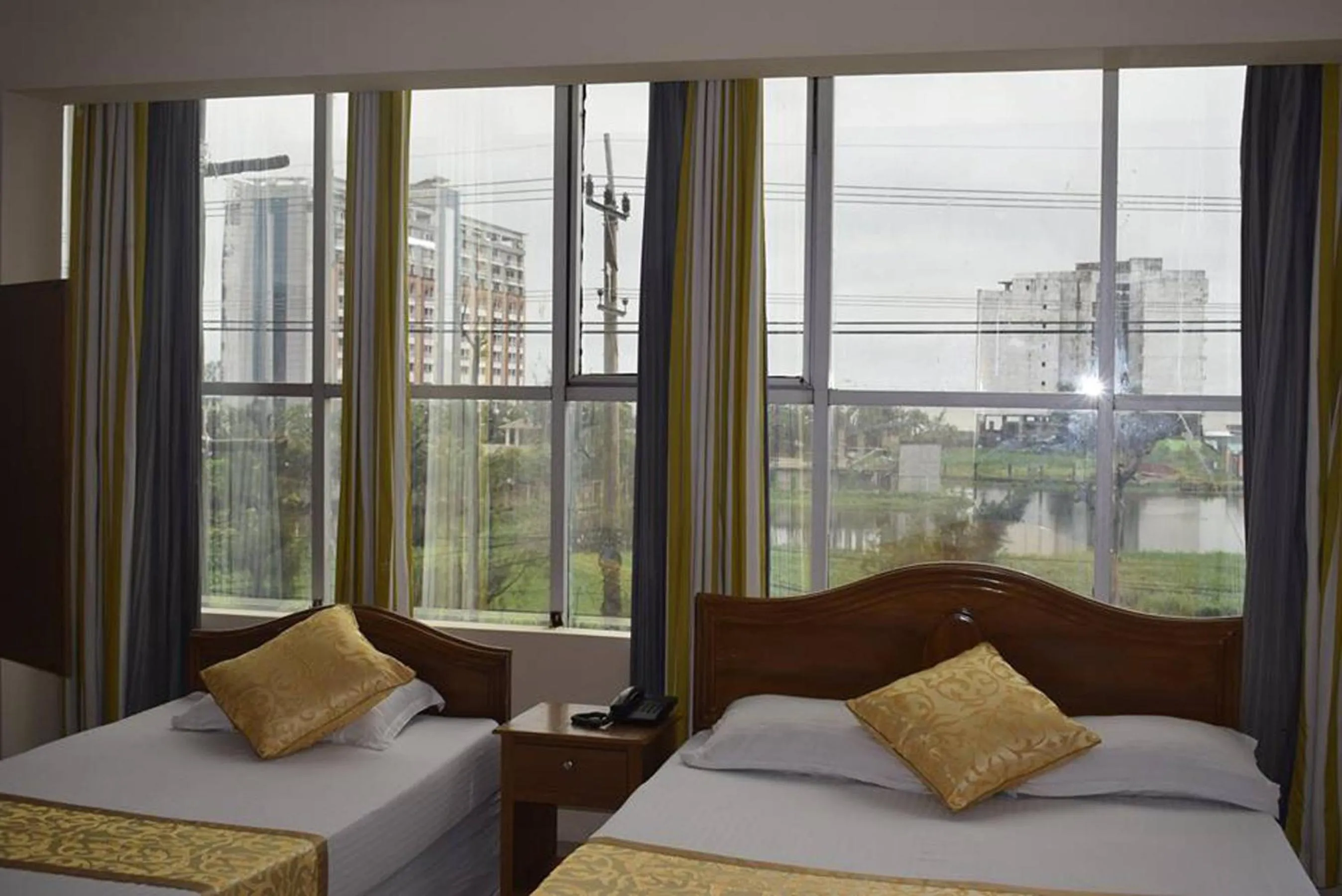 Bed in Hotel Marine Plaza