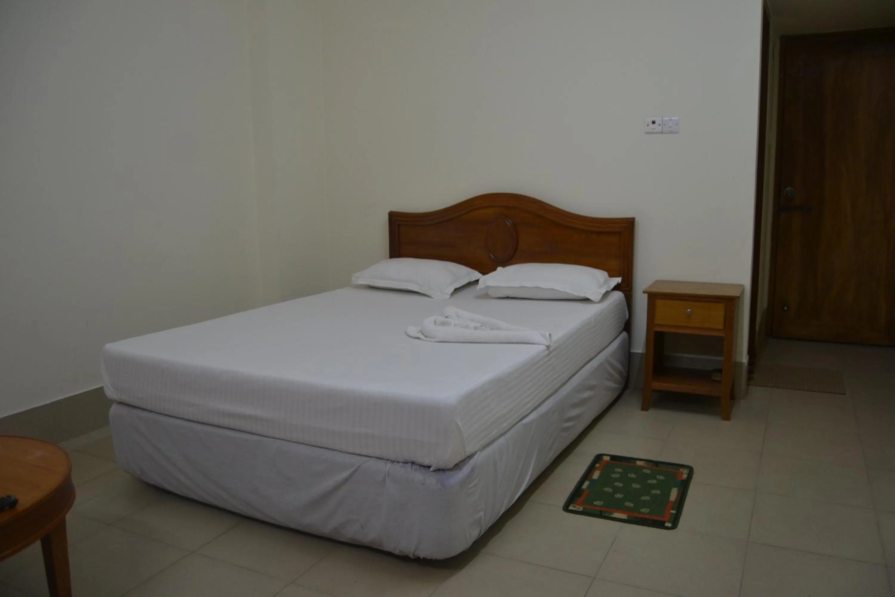 Bed in Hotel Marine Plaza