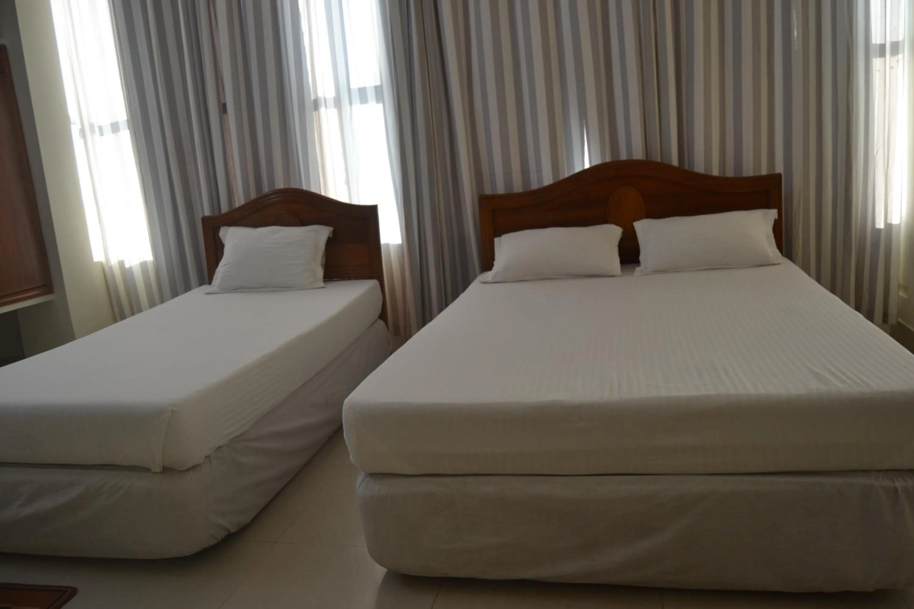 Bed in Hotel Marine Plaza
