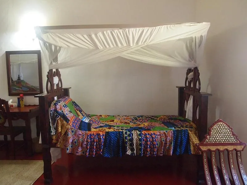 Bedroom in The Old Boma Hotel