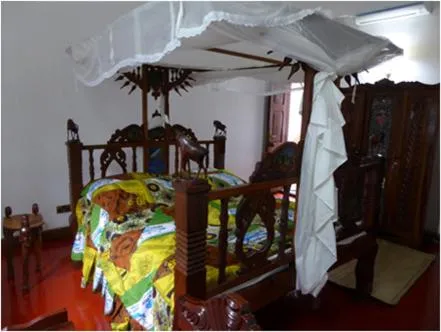 Bedroom in The Old Boma Hotel