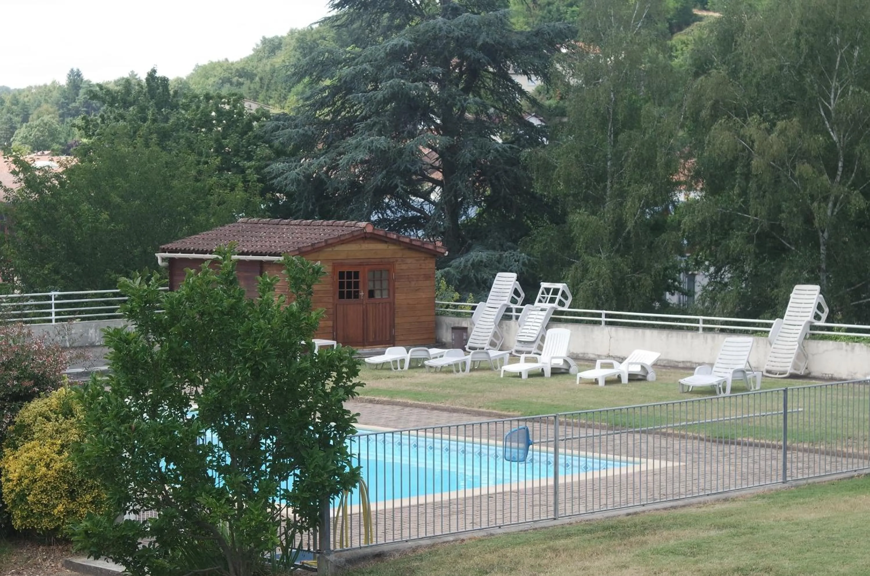 Swimming pool in Hôtel Le Tulipier