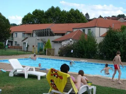 Swimming pool in Hôtel Le Tulipier