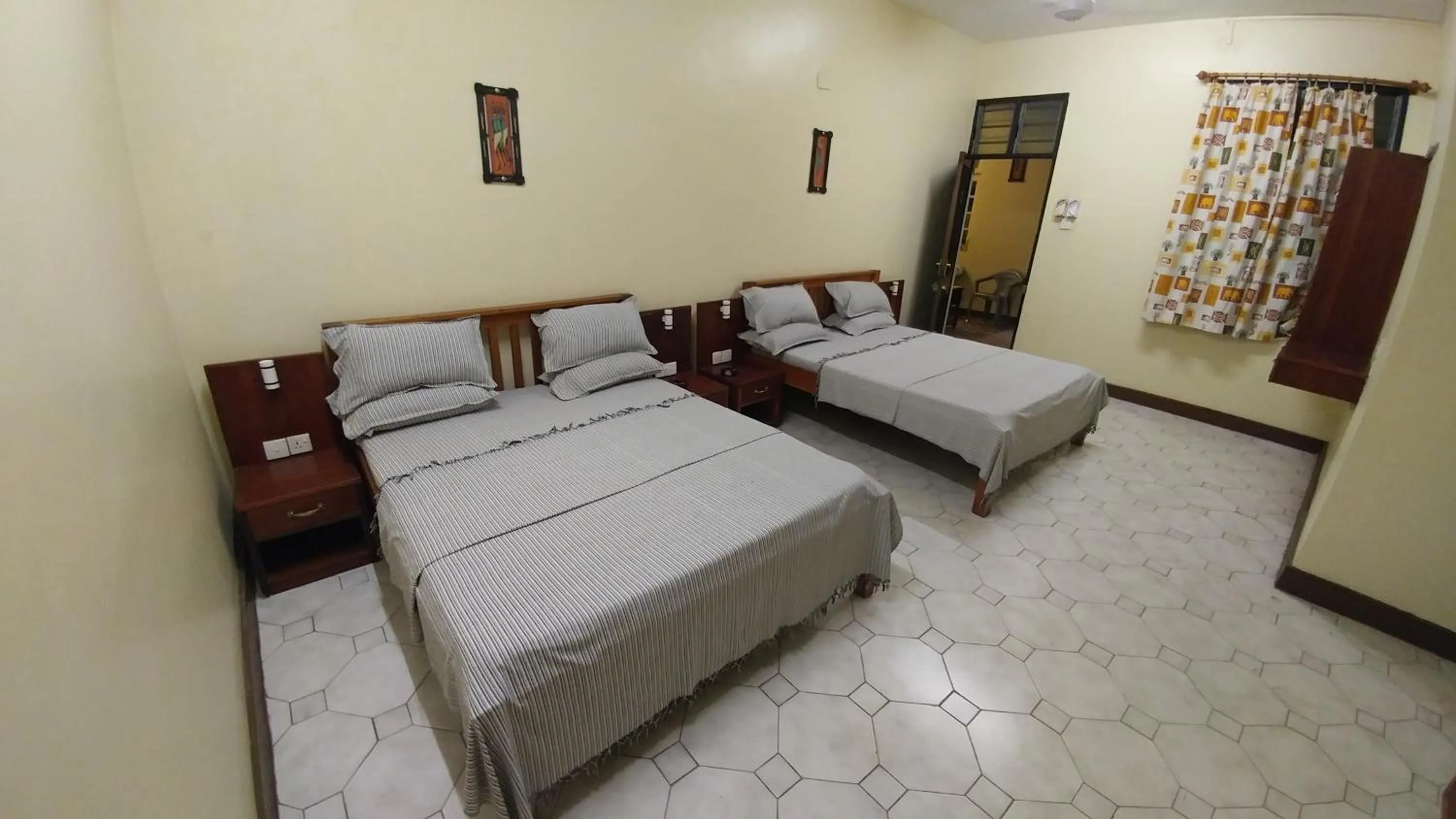 Bed in Marigold Guest House