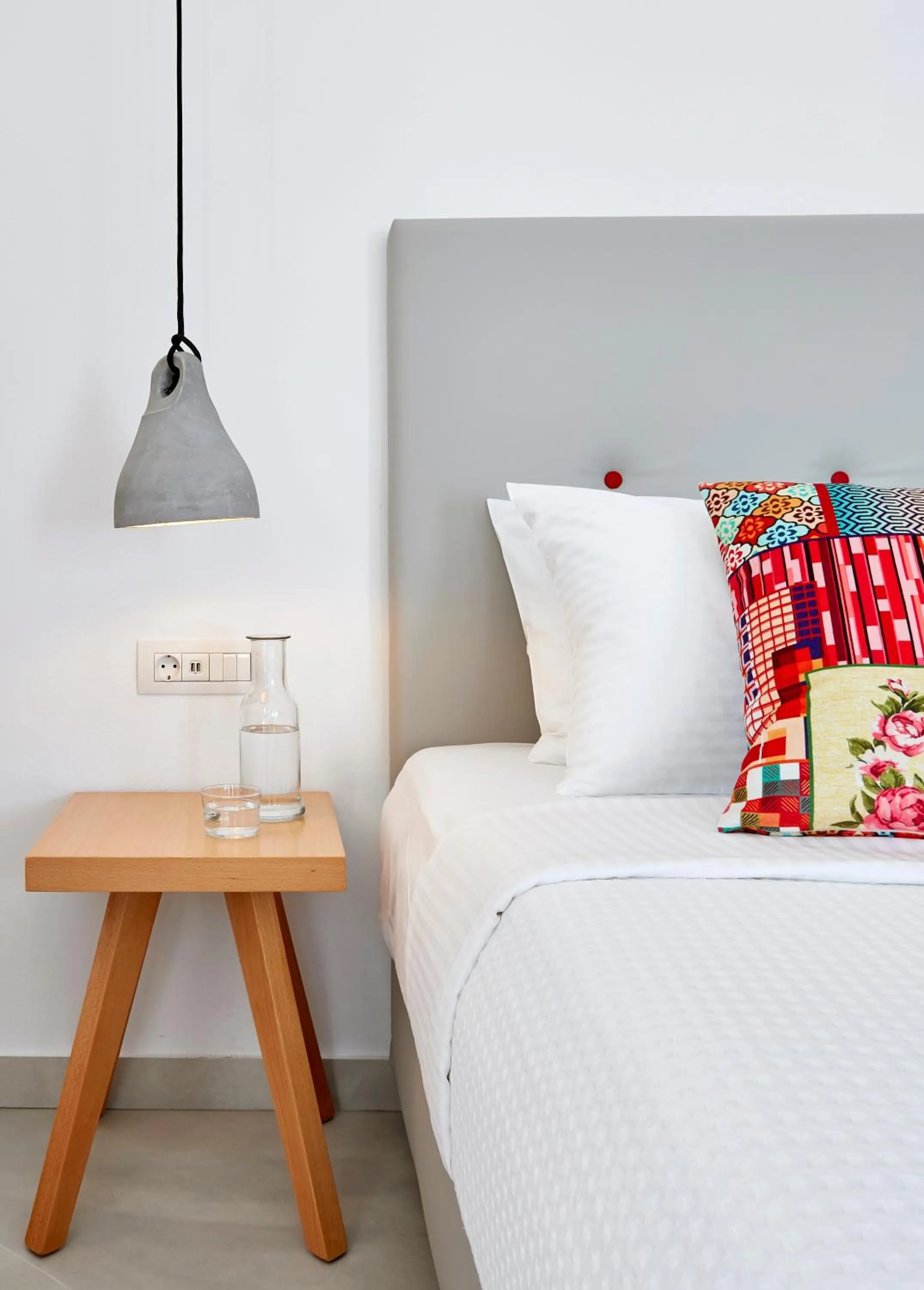 Bed in Aperanto Suites