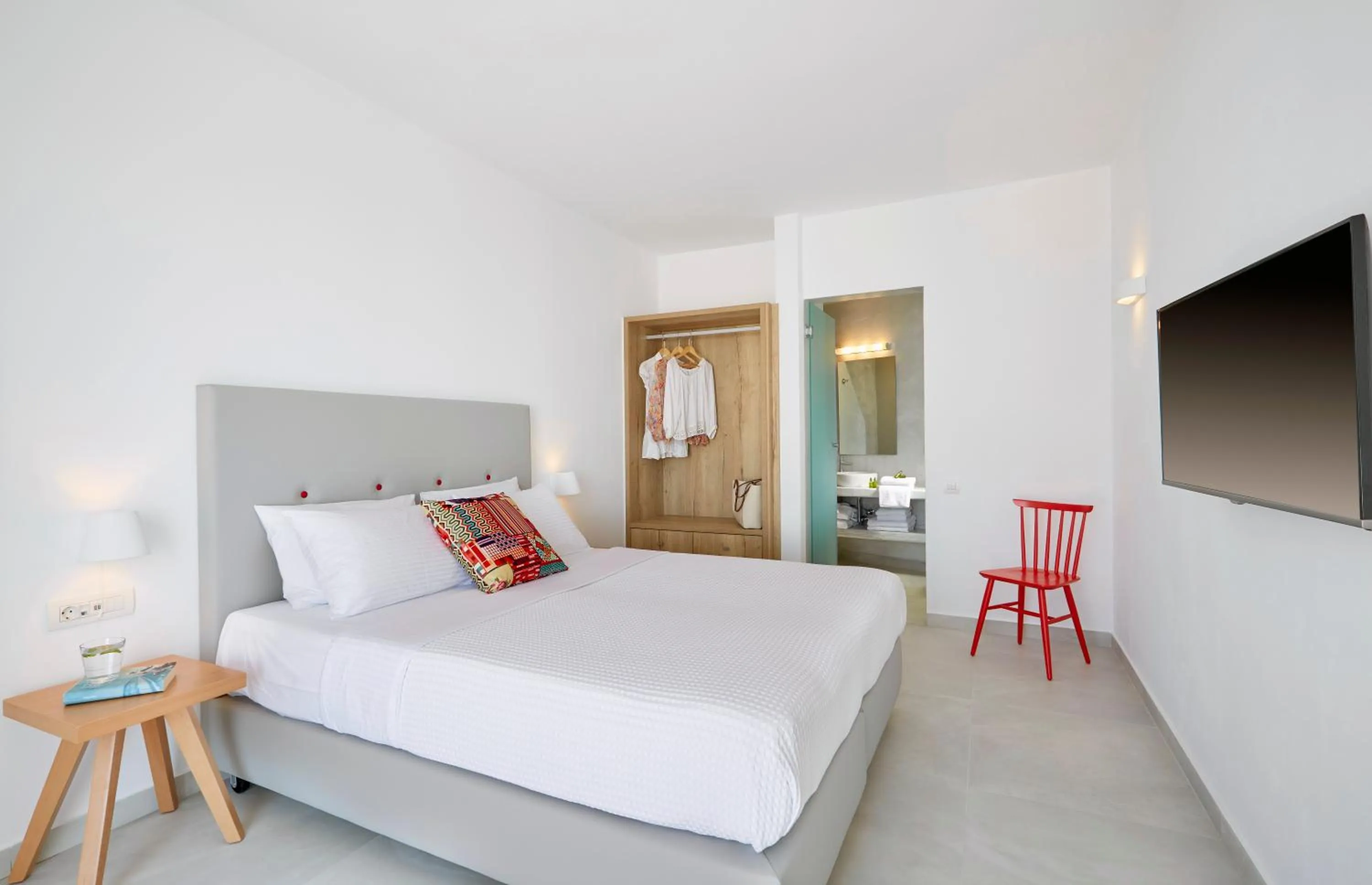 Bed in Aperanto Suites