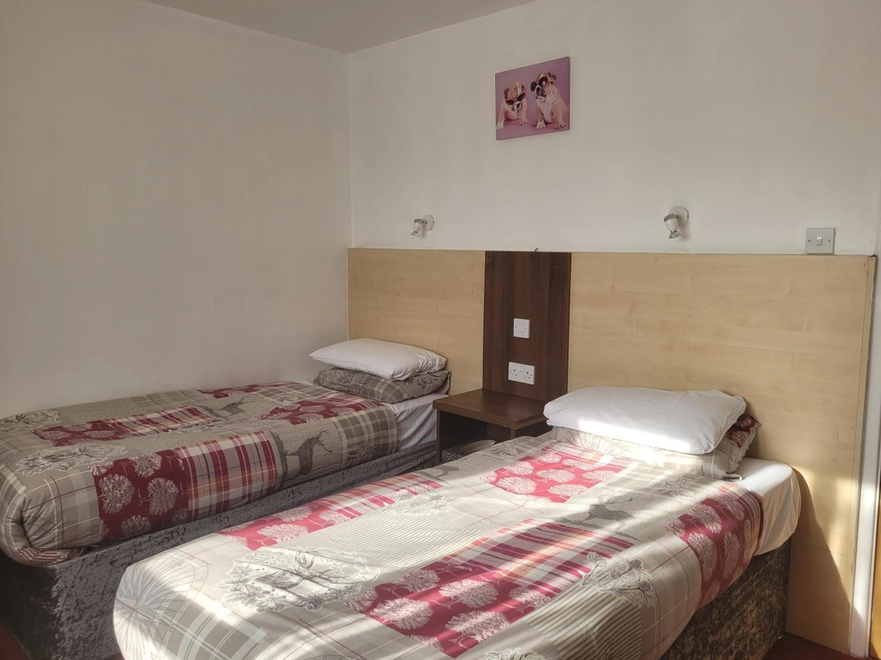 Bed in The Gatwick White House Hotel