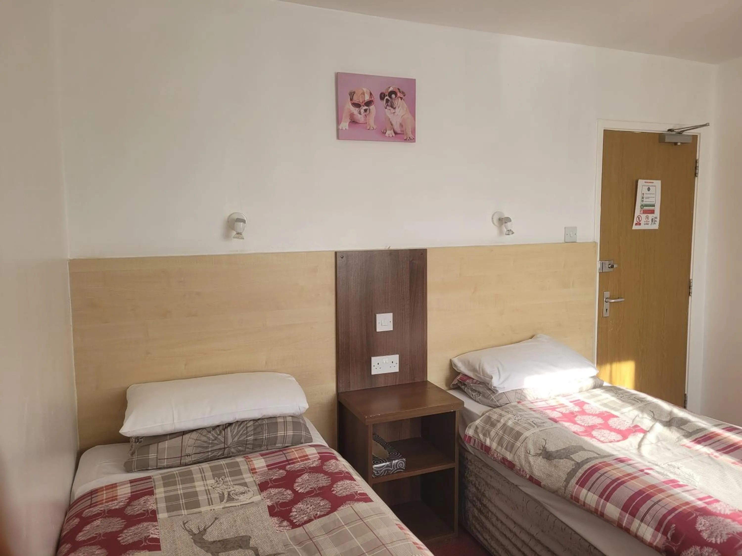 Bed in The Gatwick White House Hotel