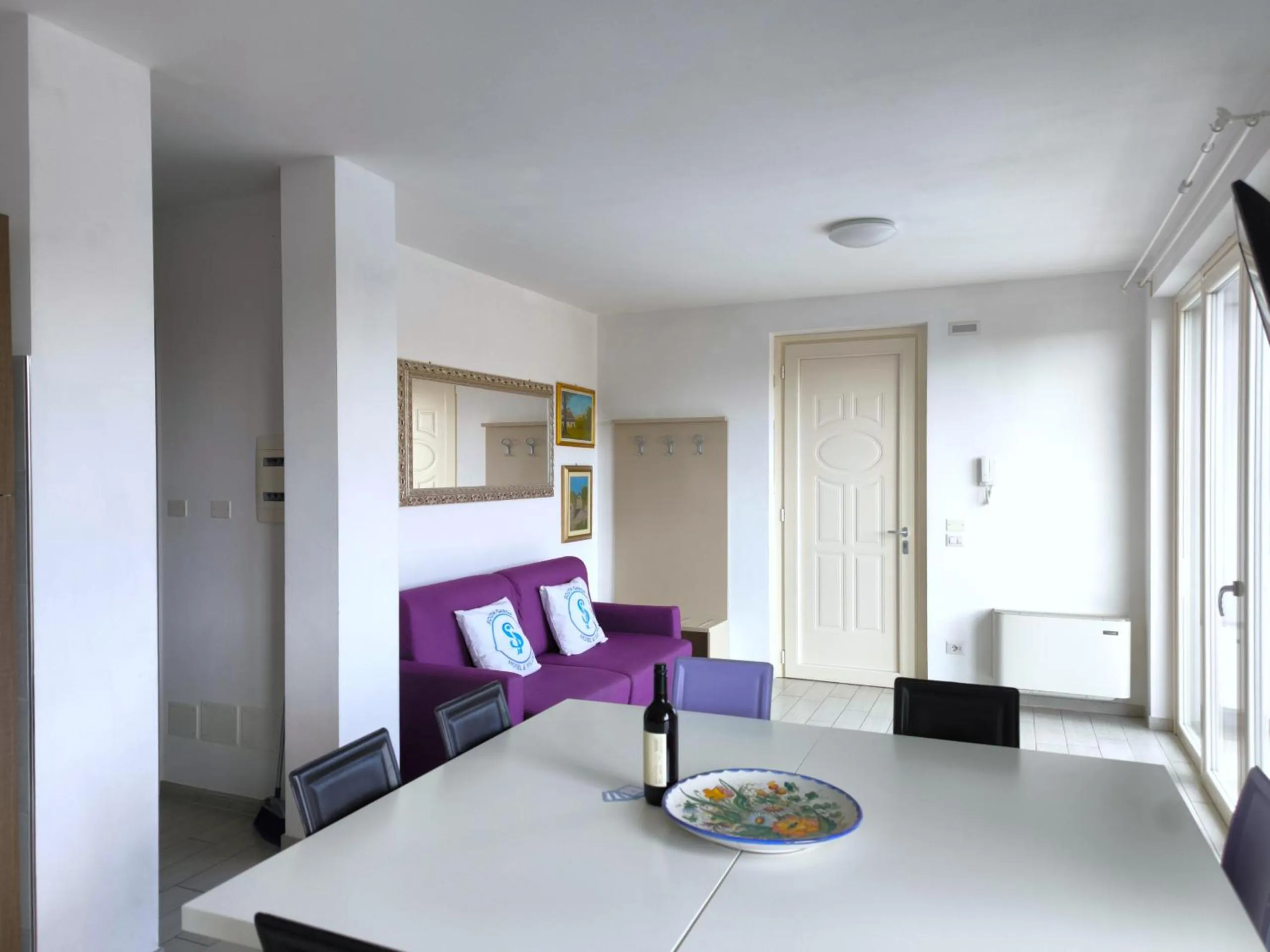 Communal lounge/ TV room in Residenza Pastrengo