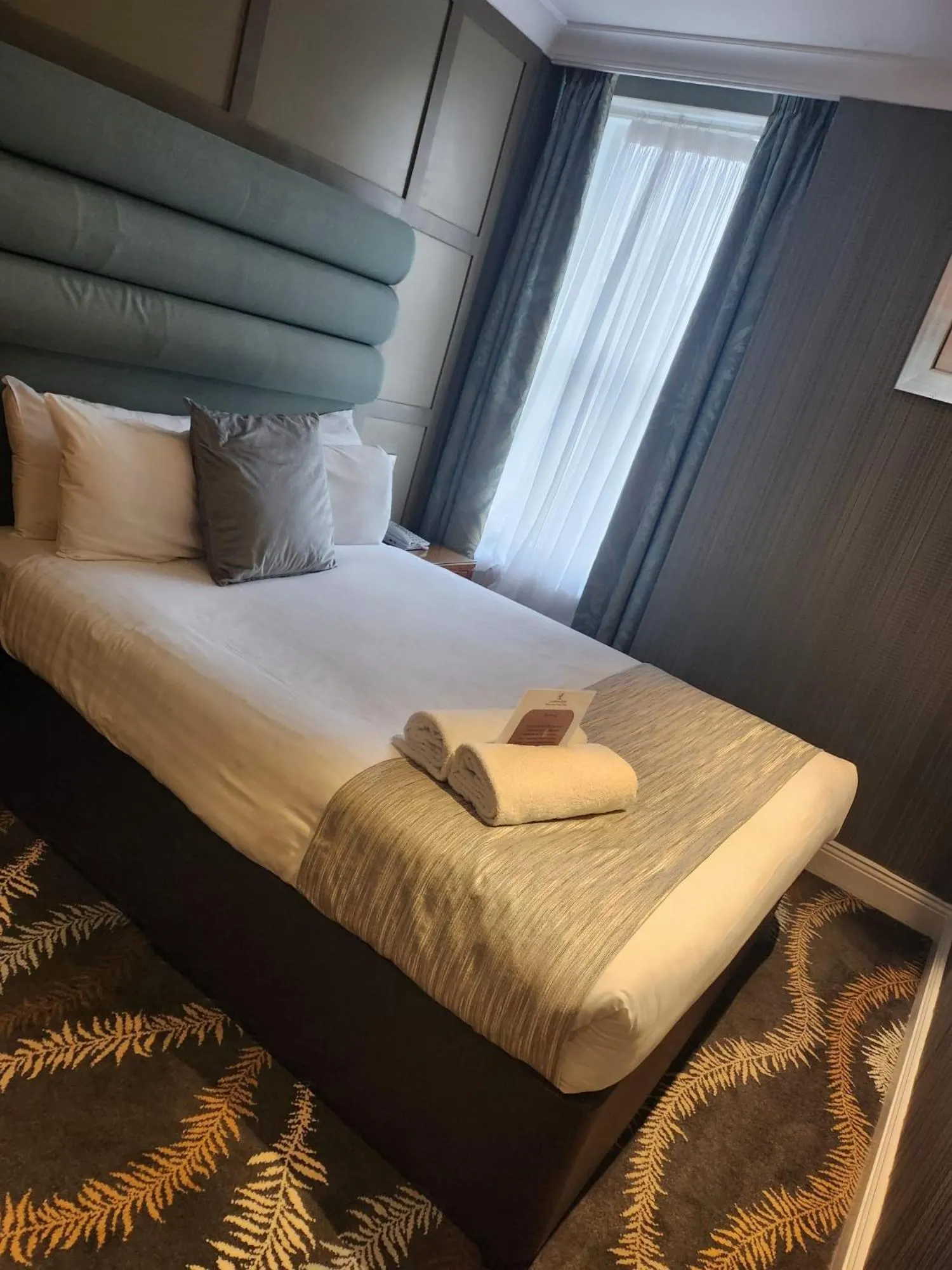 Bed in Caledonian Hotel