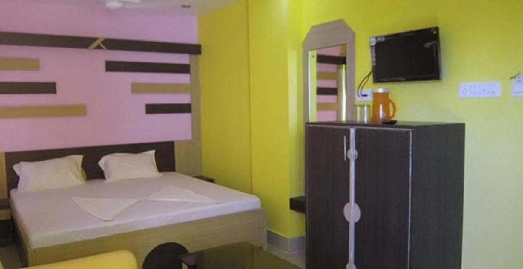 Bed in Hotel Srikrishna International