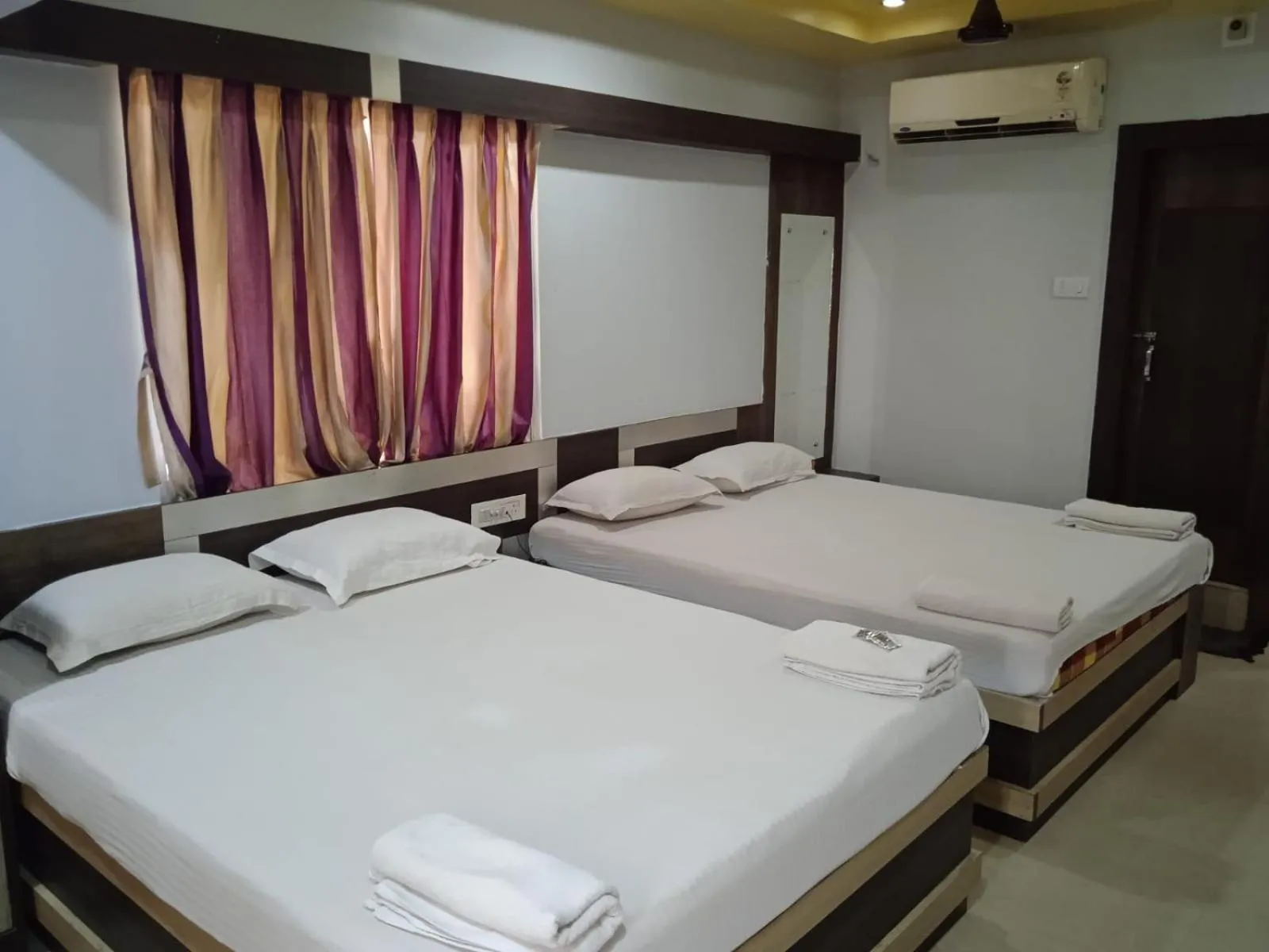 Bed in Hotel Srikrishna International