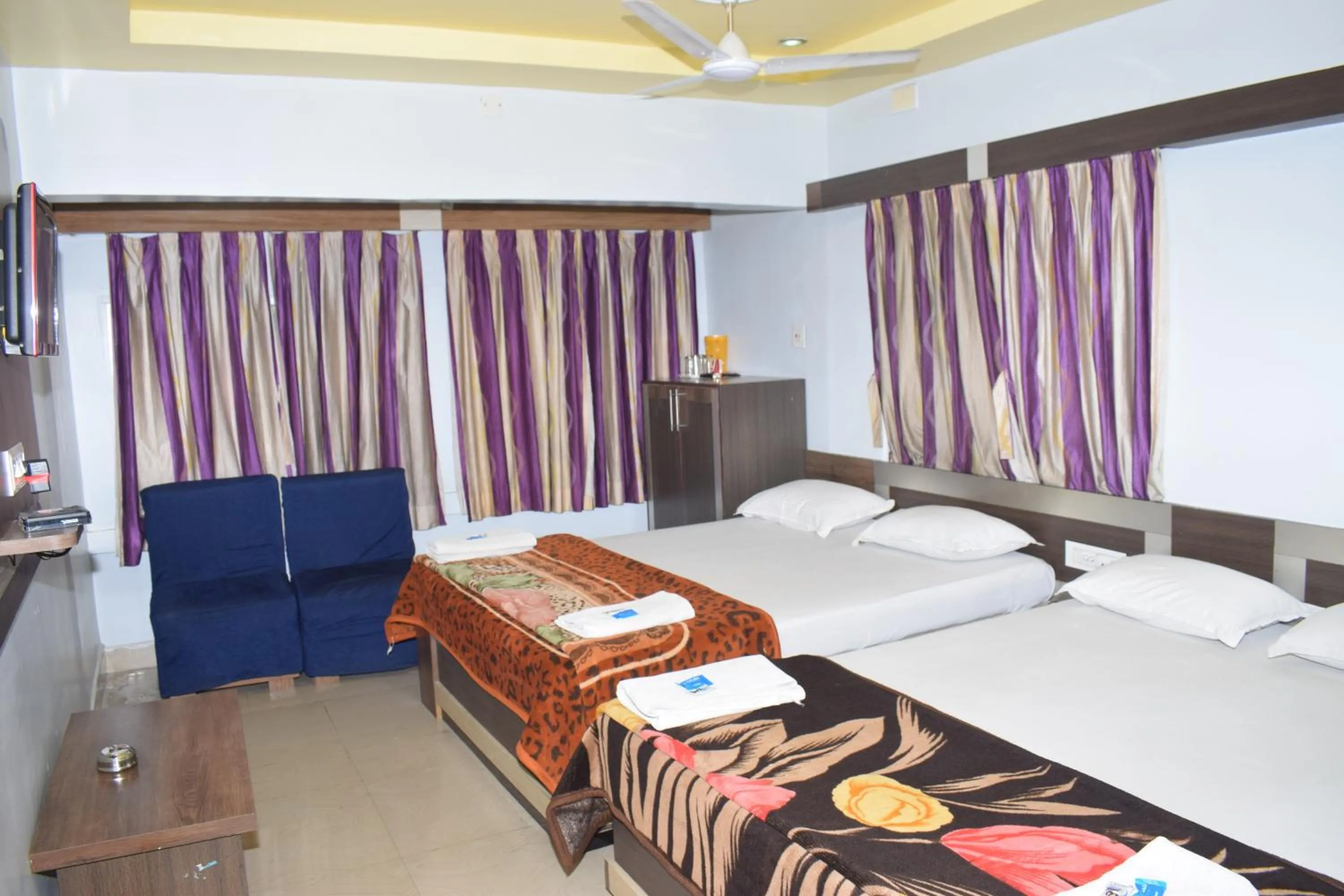 Bed in Hotel Srikrishna International