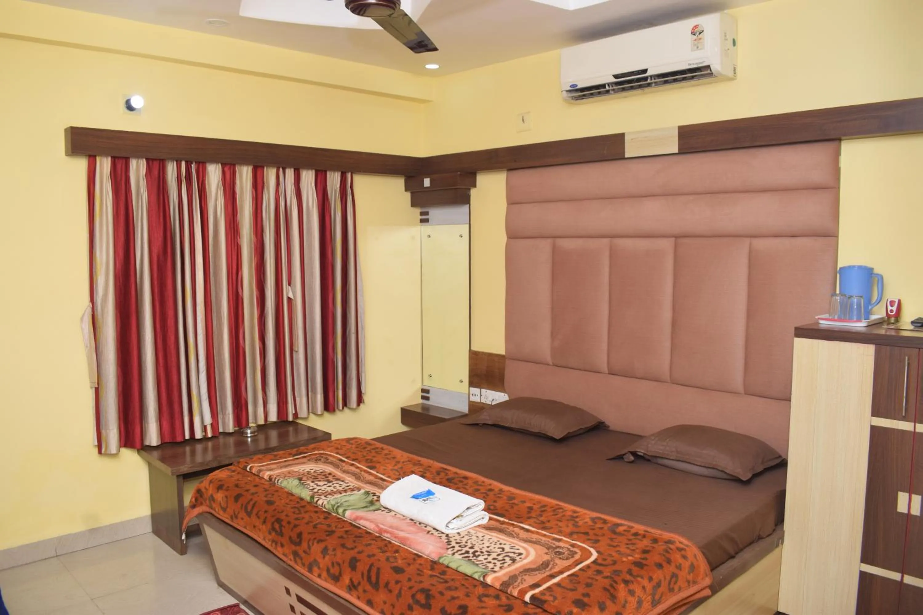 Bed in Hotel Srikrishna International