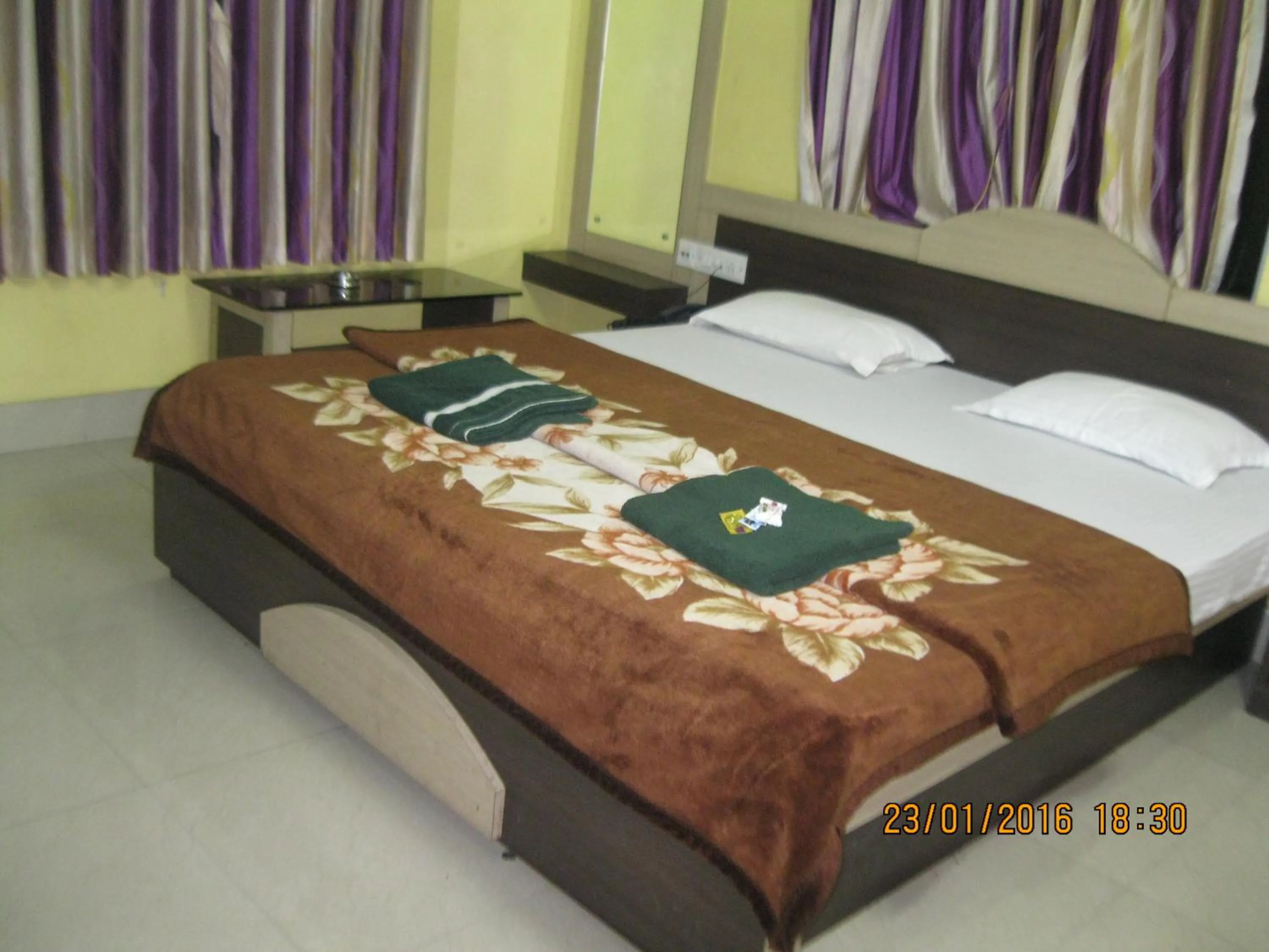 Bed in Hotel Srikrishna International