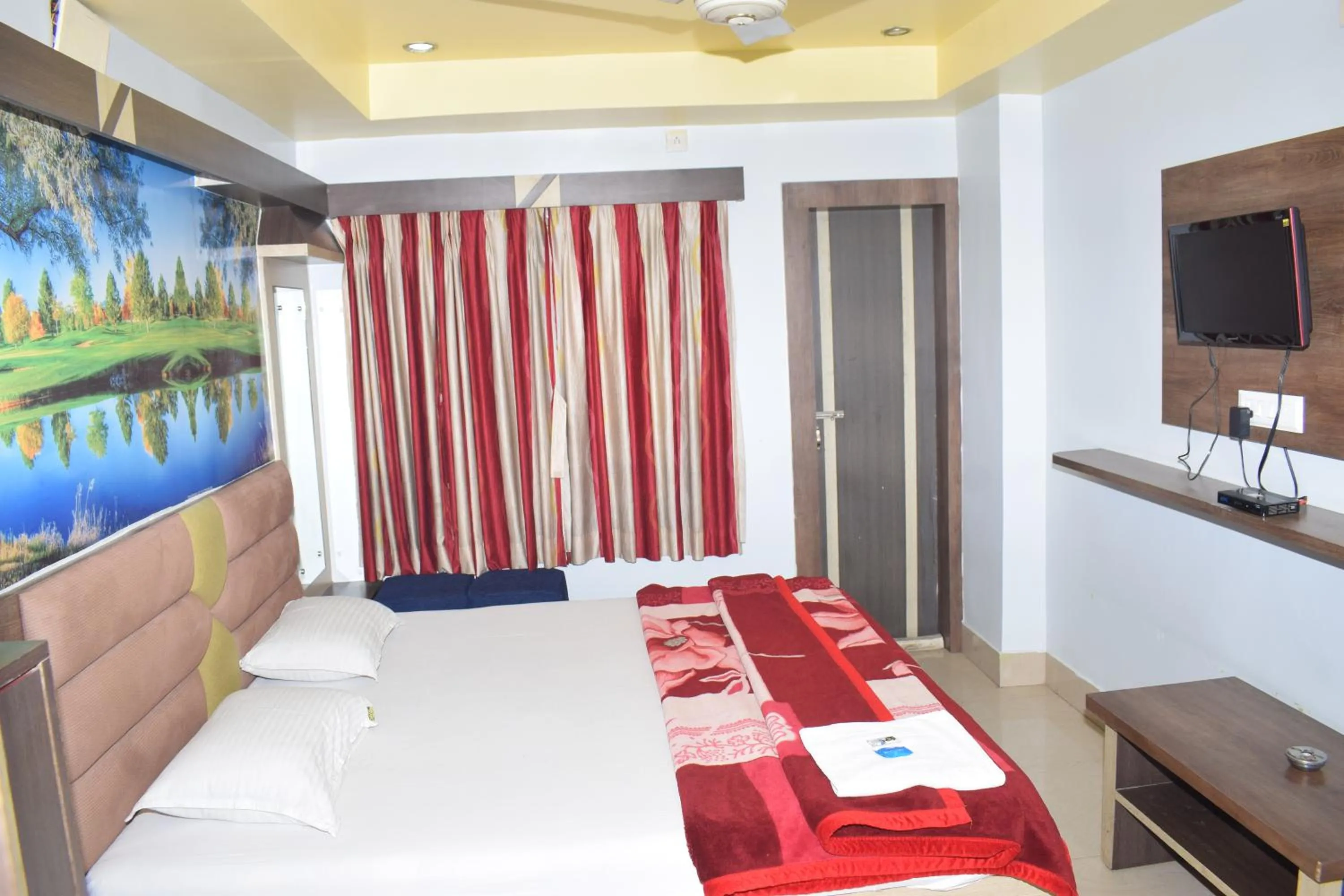Bed in Hotel Srikrishna International