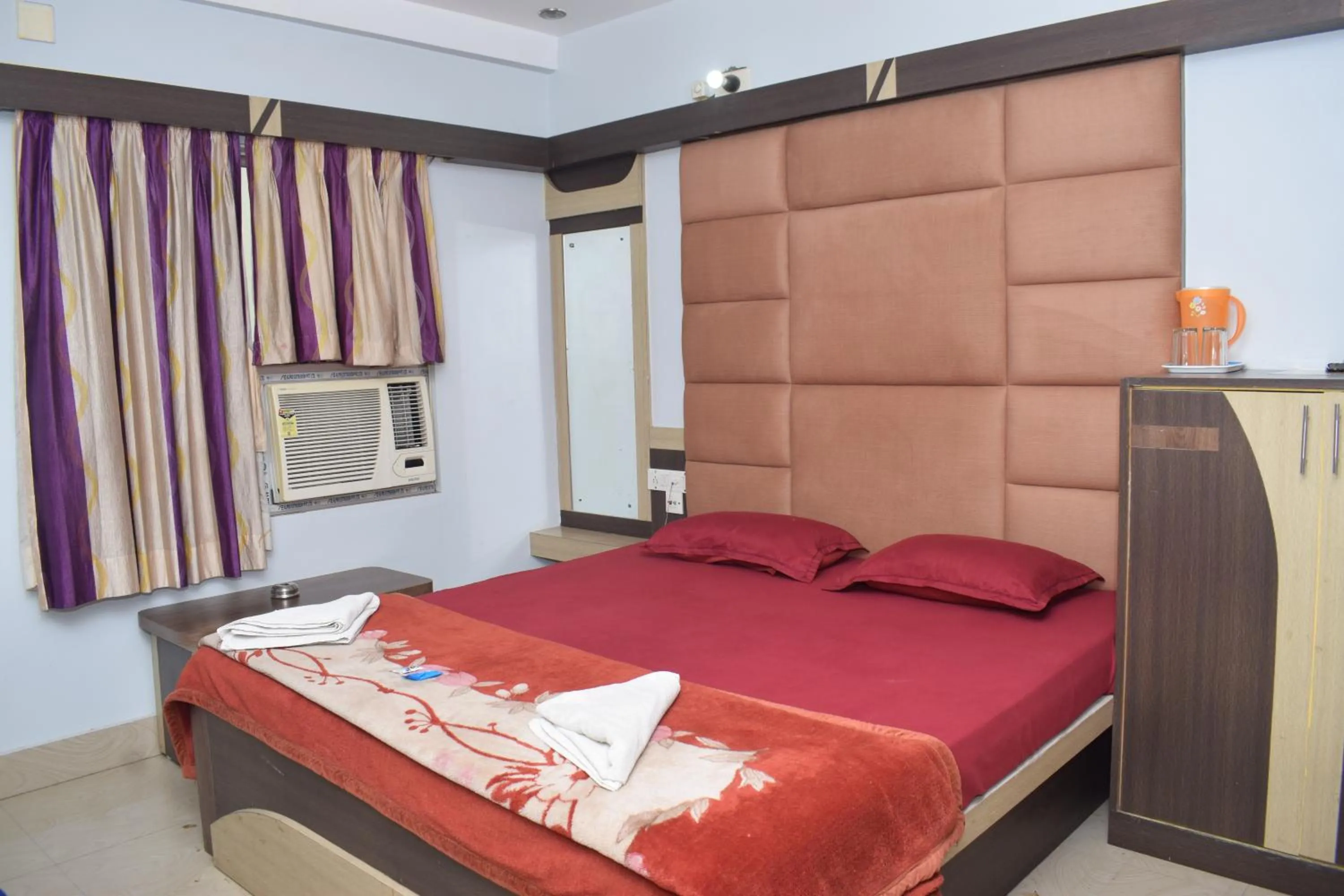 Bed in Hotel Srikrishna International