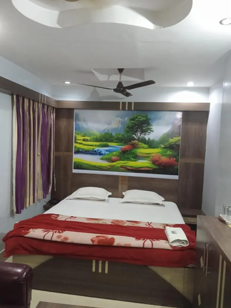 Bed in Hotel Srikrishna International