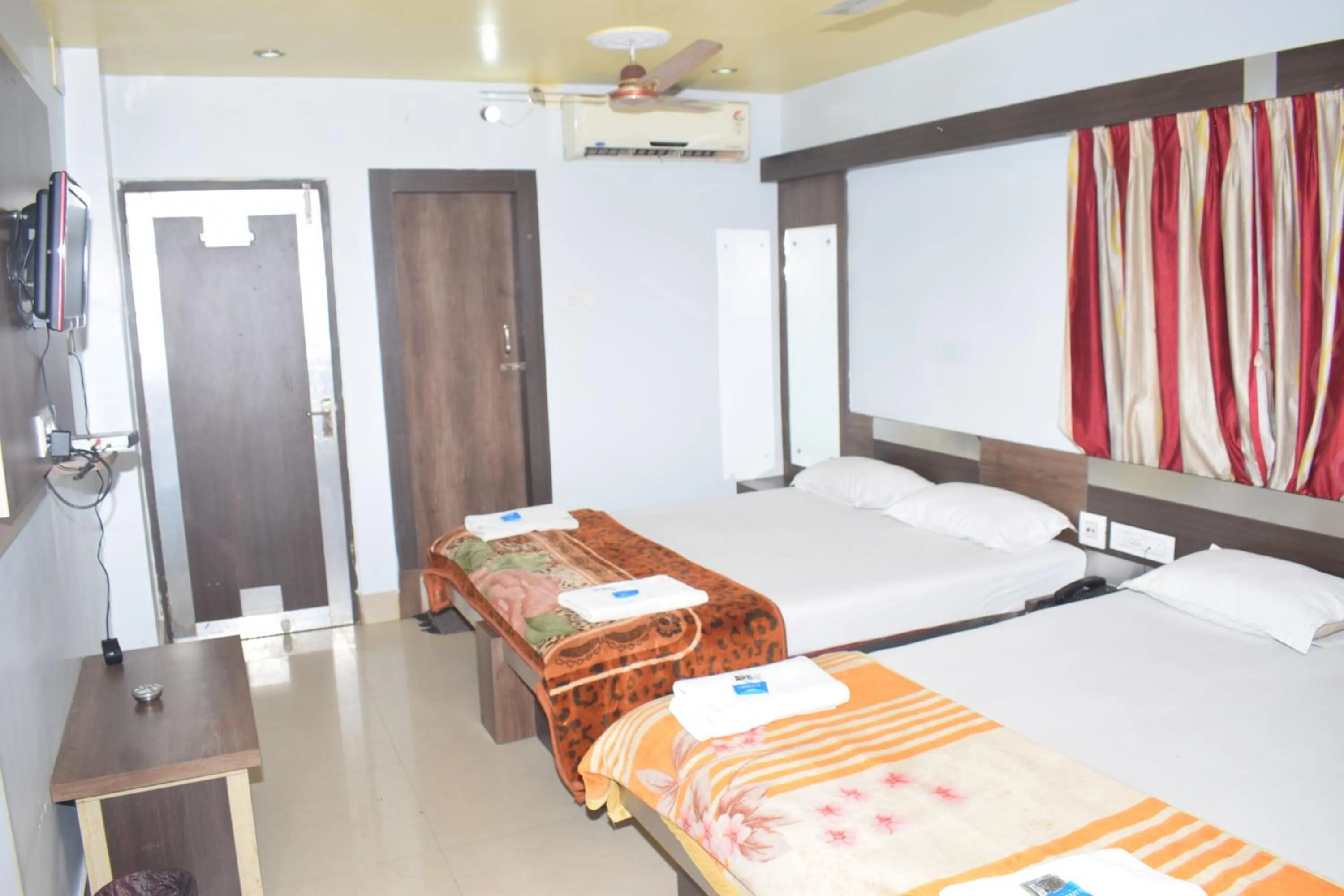 Bed in Hotel Srikrishna International