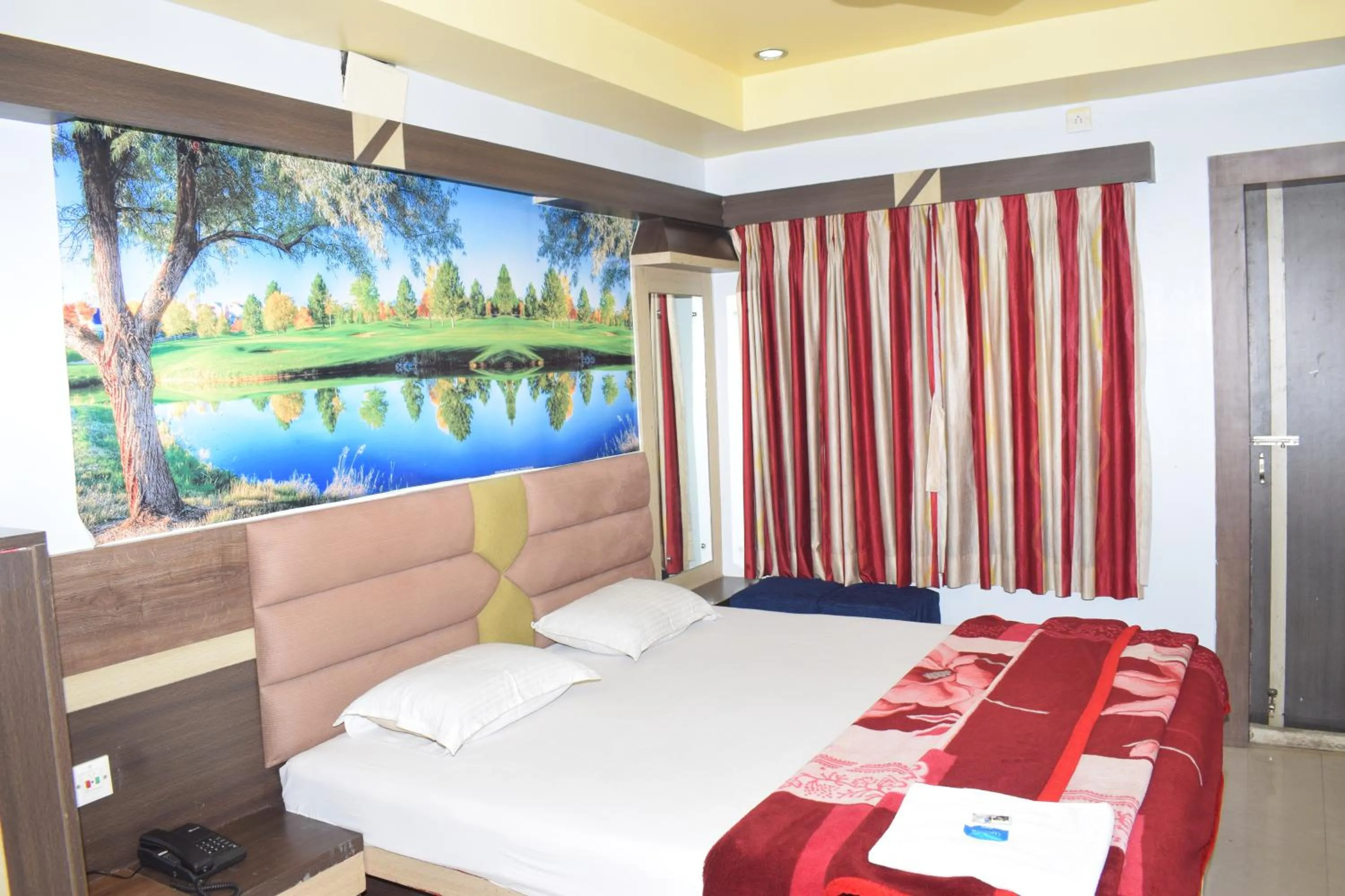 Bed in Hotel Srikrishna International