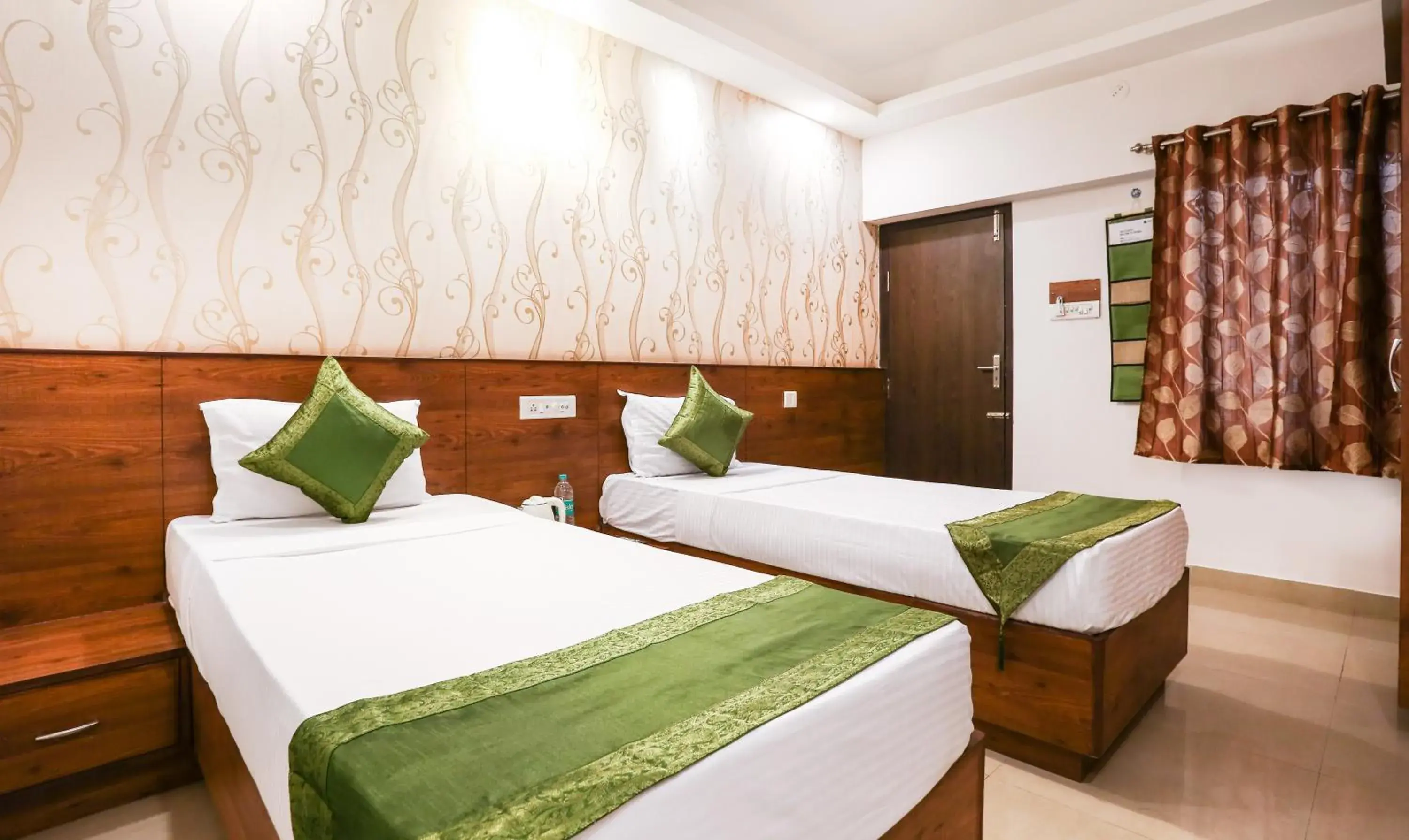 Standard Room With Queen Bed - single occupancy in Treebo Comforts Inn, University Road Deralakatte Standard Room With Queen Bed - single occupancy in Treebo Comforts Inn, University Road Deralakatte