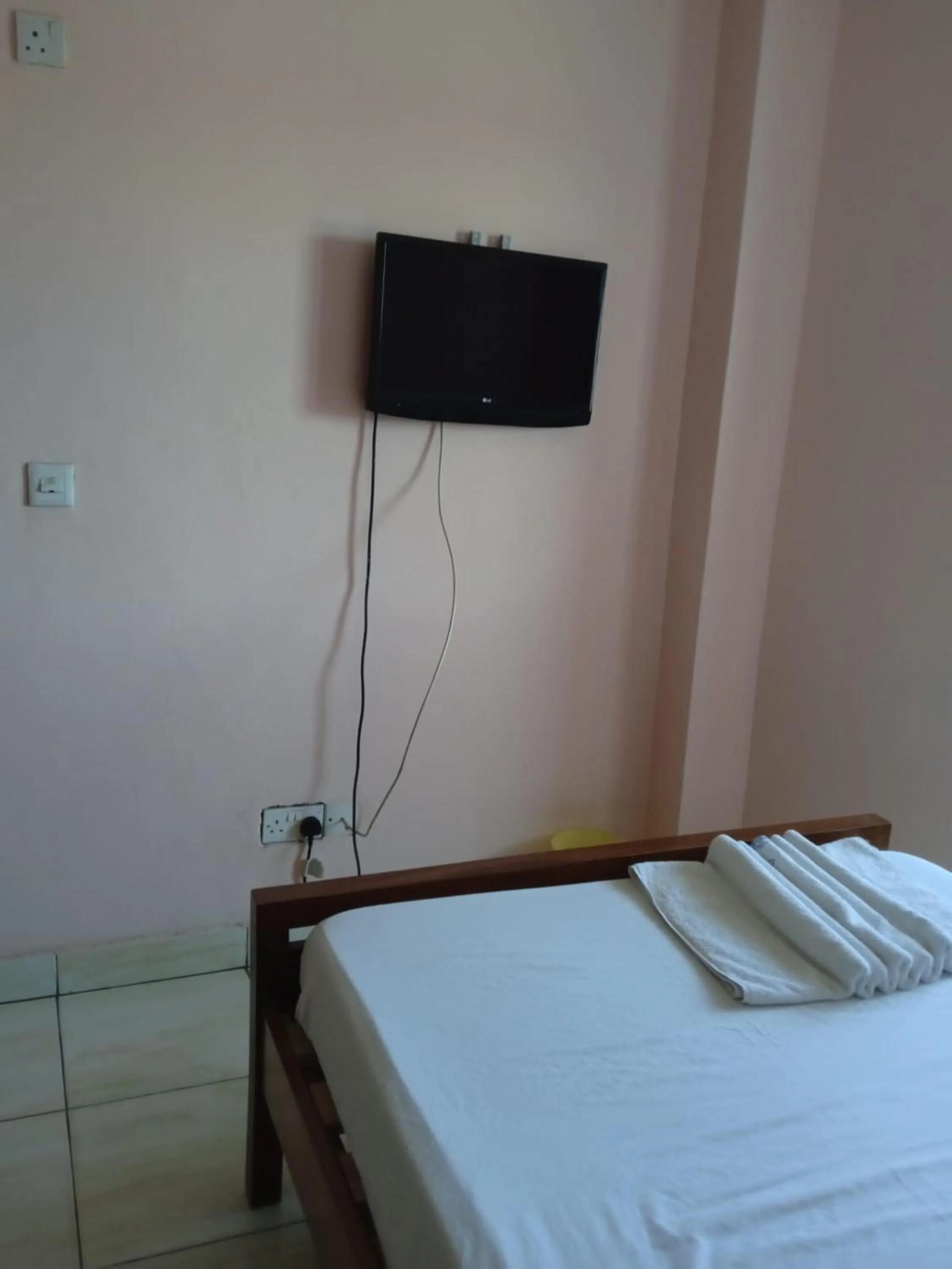 TV and multimedia in Checkpoint Inn Hotel, Mombasa