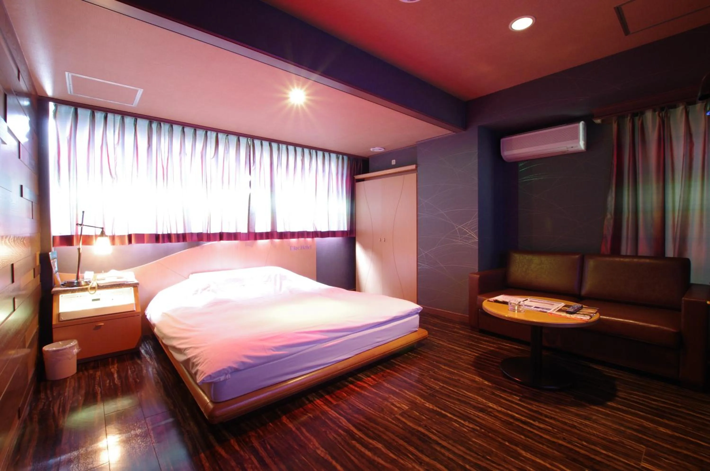 Photo of the whole room, Bed in BlueHotel sju(:)pri:m (Adult Only)