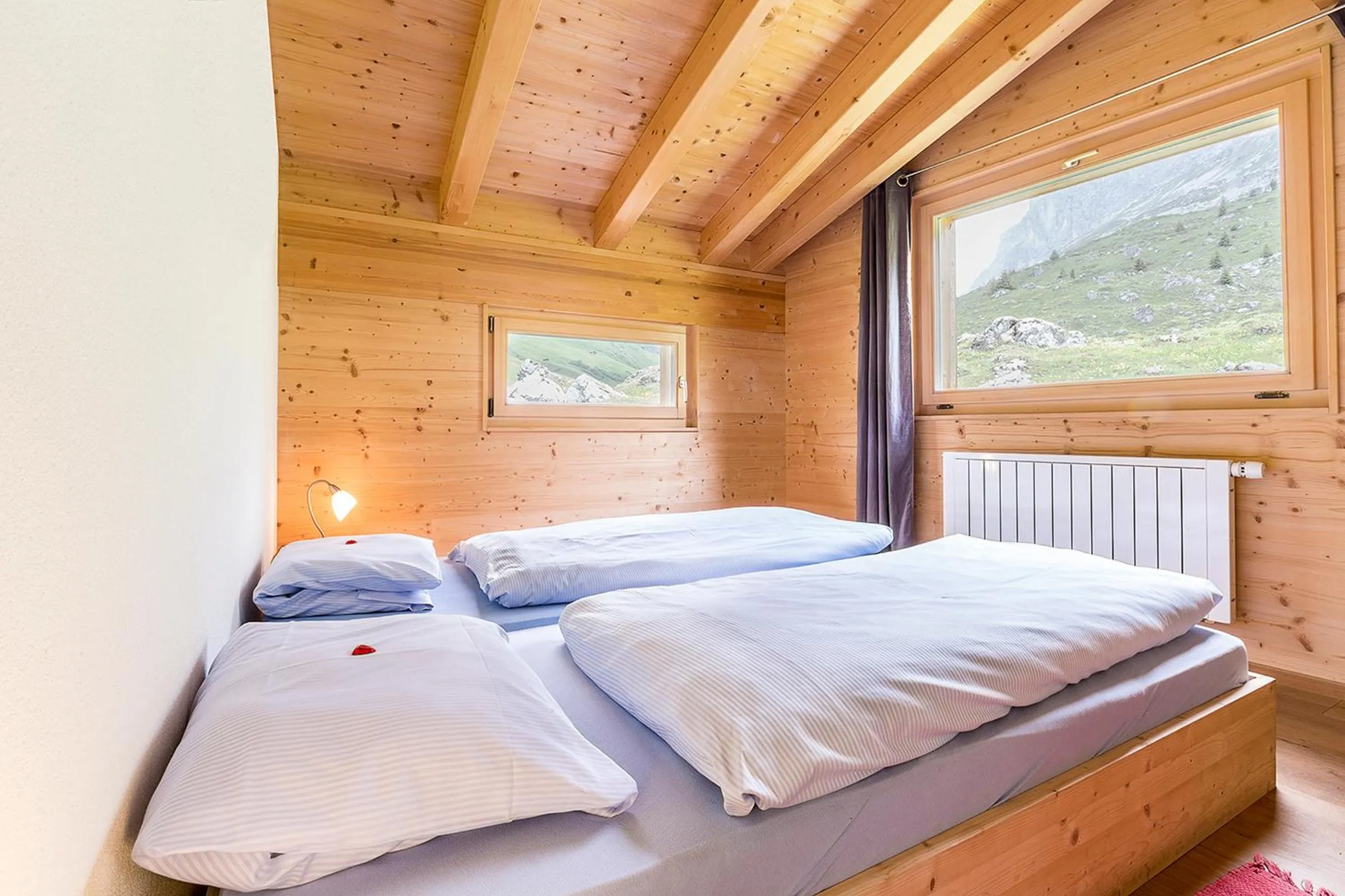 Photo of the whole room, Bed in Berghaus Sulzfluh