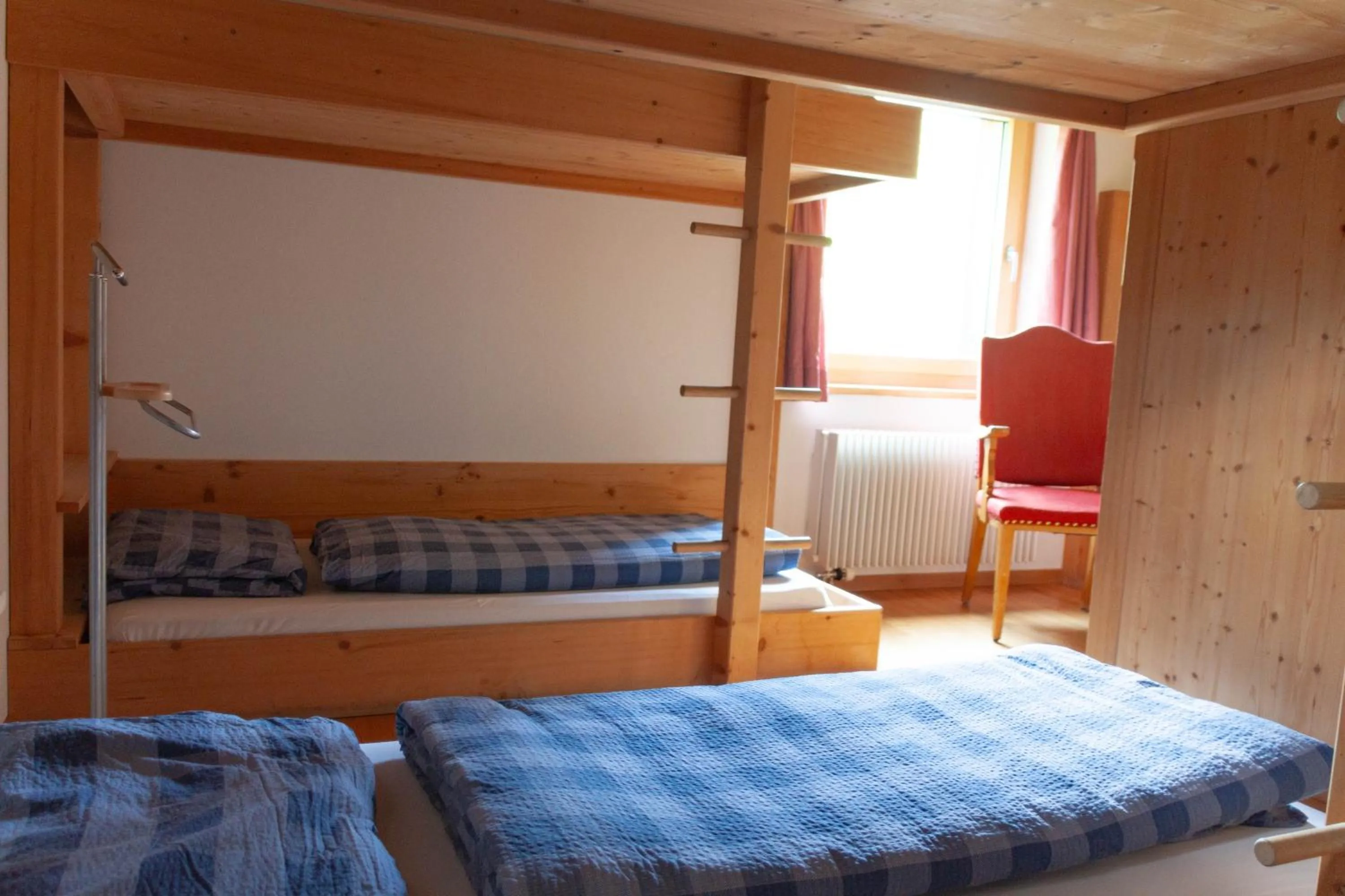 Photo of the whole room, Bed in Berghaus Sulzfluh