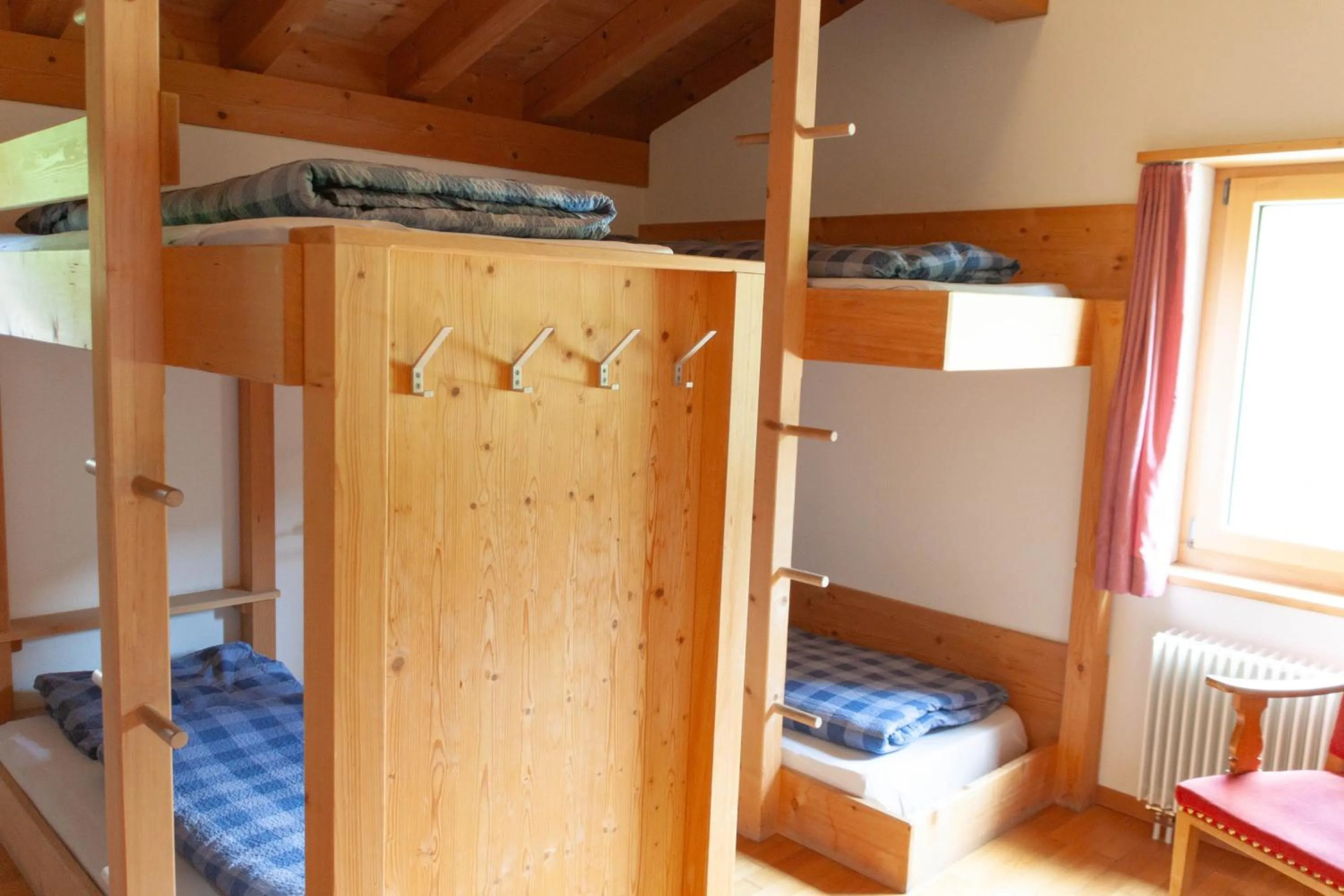 Photo of the whole room, Bed in Berghaus Sulzfluh