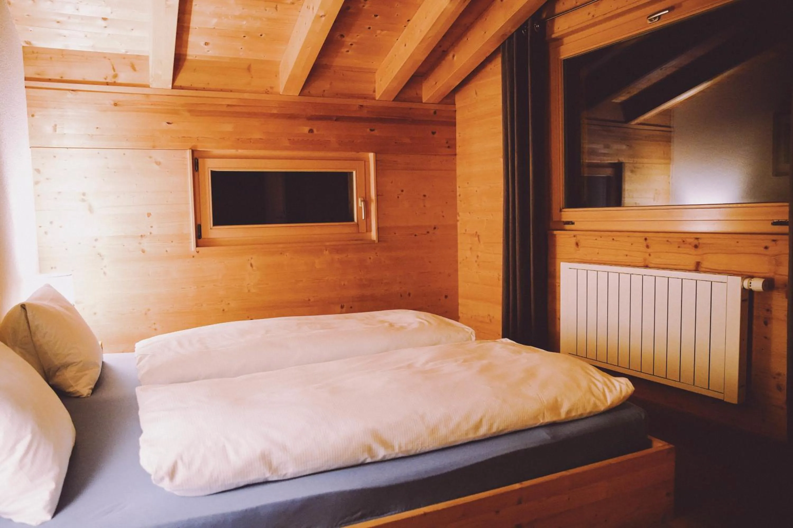 Photo of the whole room, Bed in Berghaus Sulzfluh
