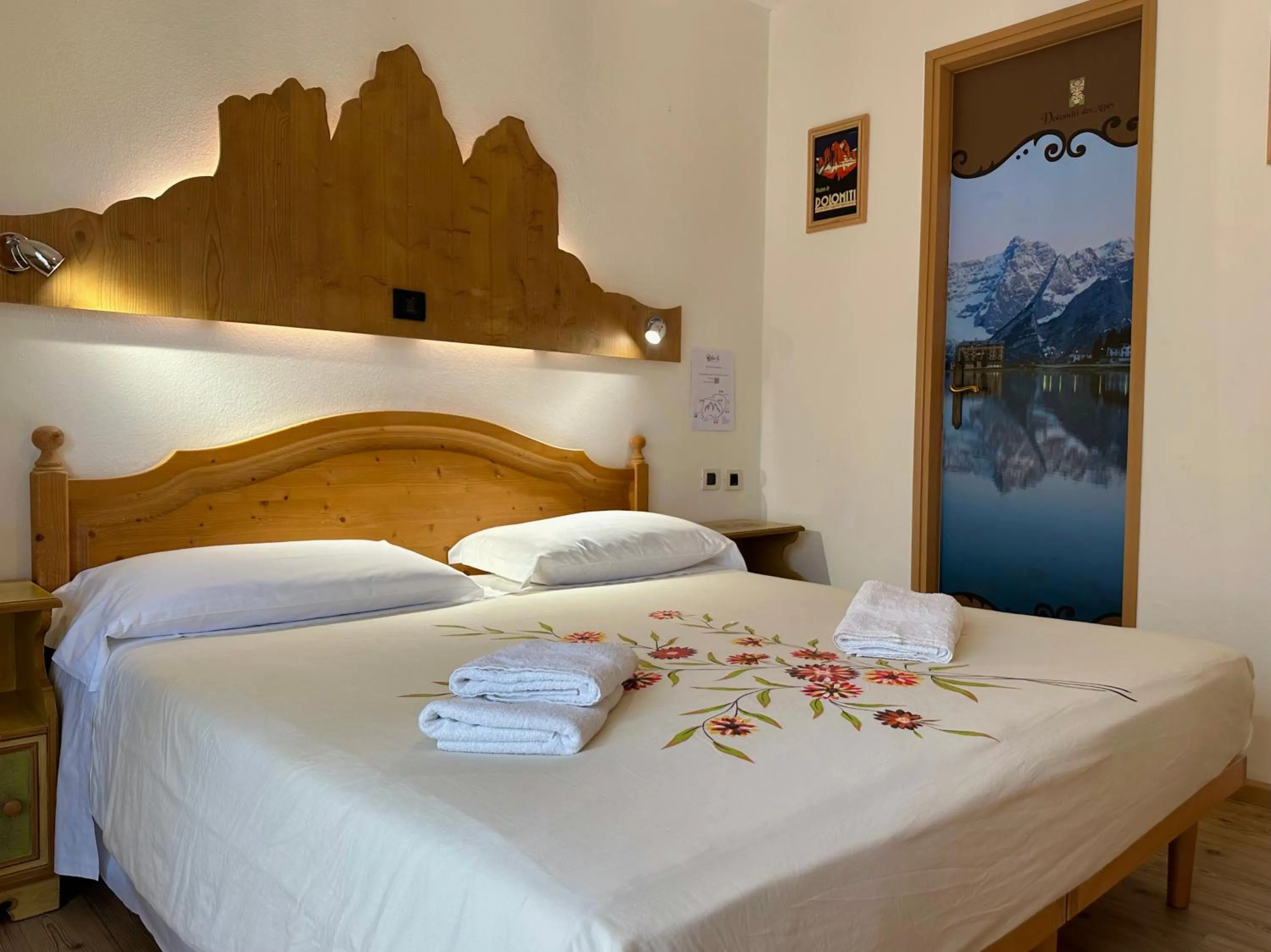 Bed in Hotel Dolomiti Des Alpes