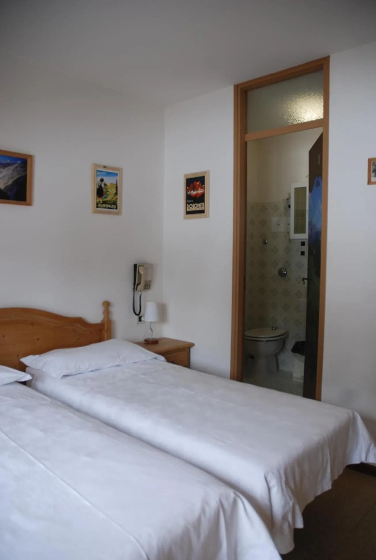 Bed in Hotel Dolomiti Des Alpes