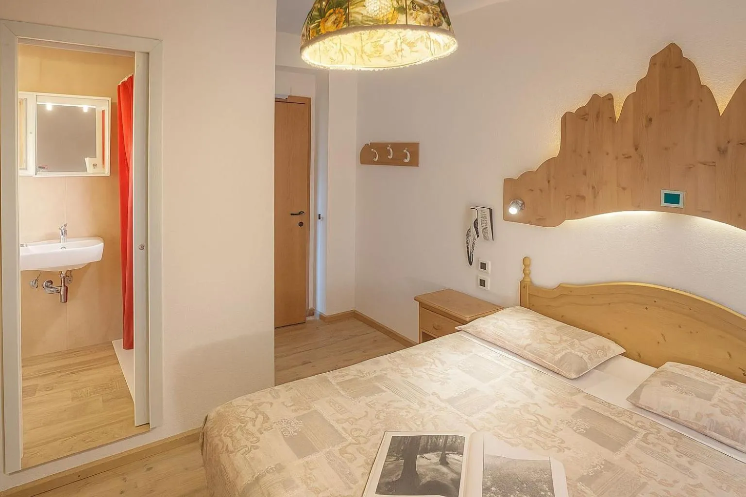 Bed in Hotel Dolomiti Des Alpes