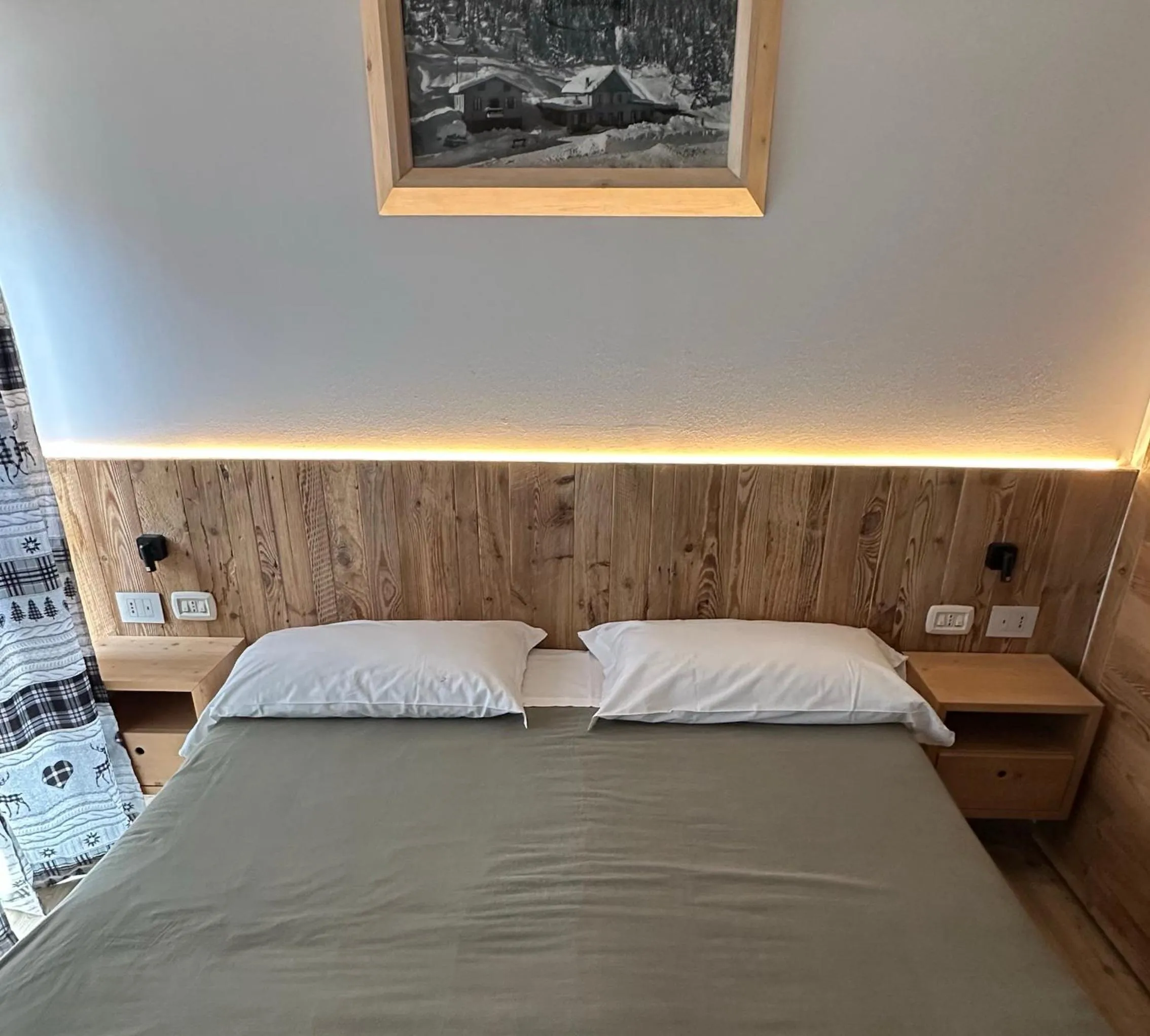 Bed in Hotel Dolomiti Des Alpes