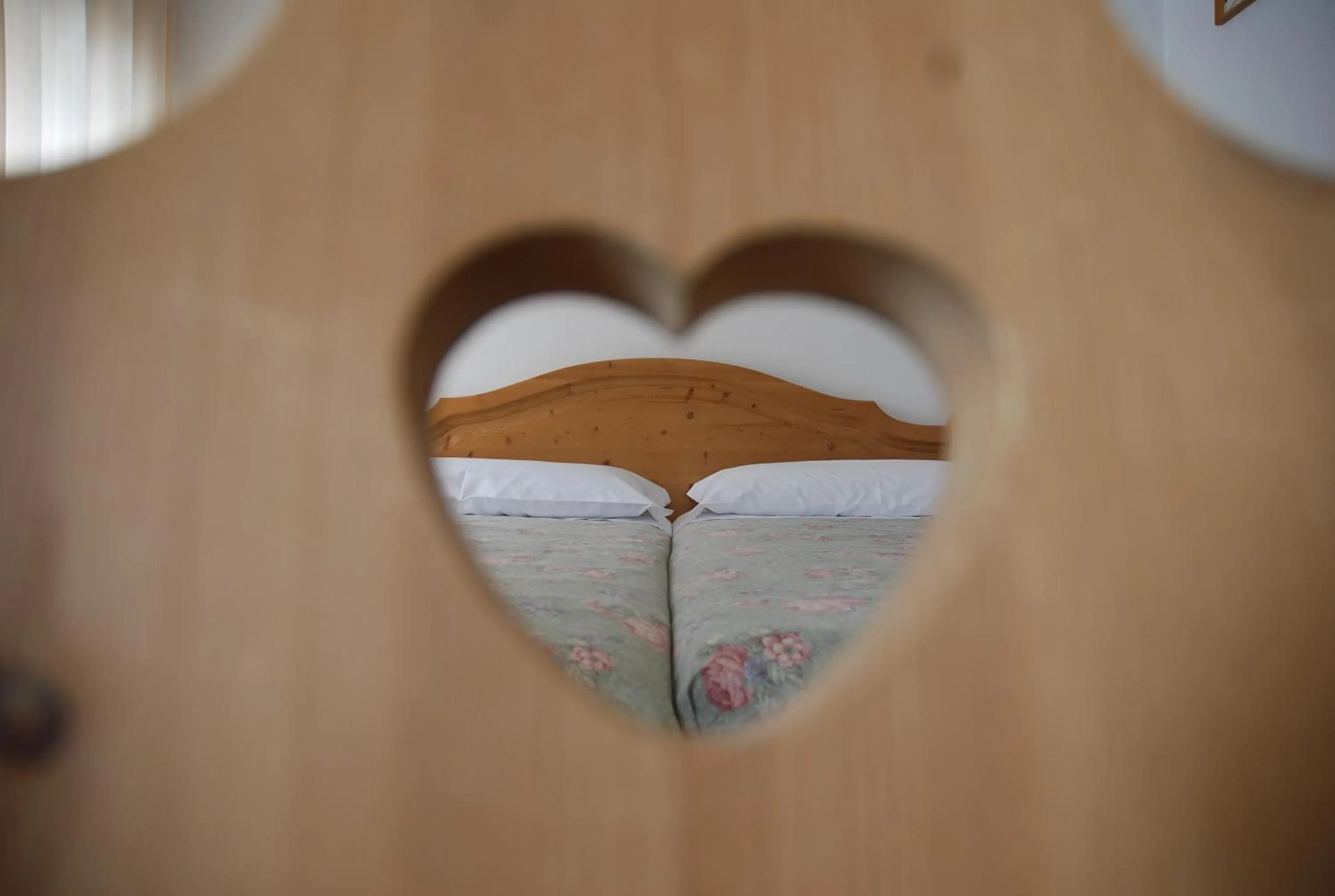 Bed in Hotel Dolomiti Des Alpes