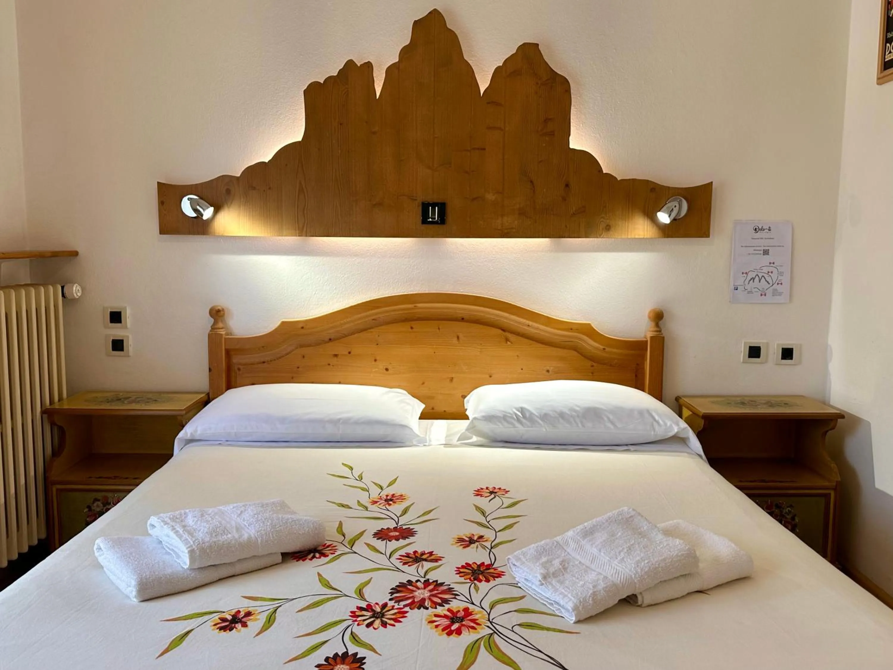 Bed in Hotel Dolomiti Des Alpes