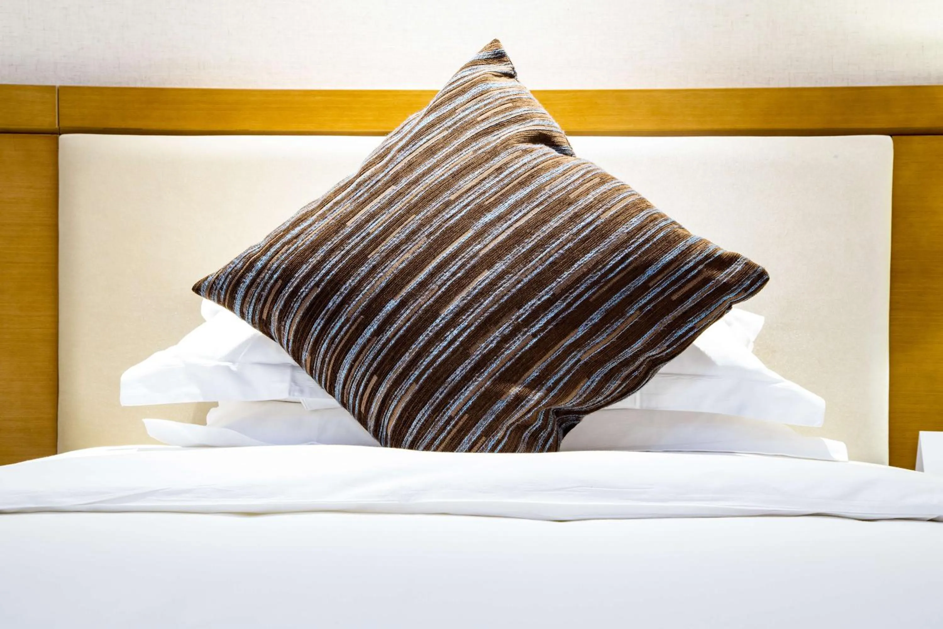 Bed in Ramada Encore Wuhan