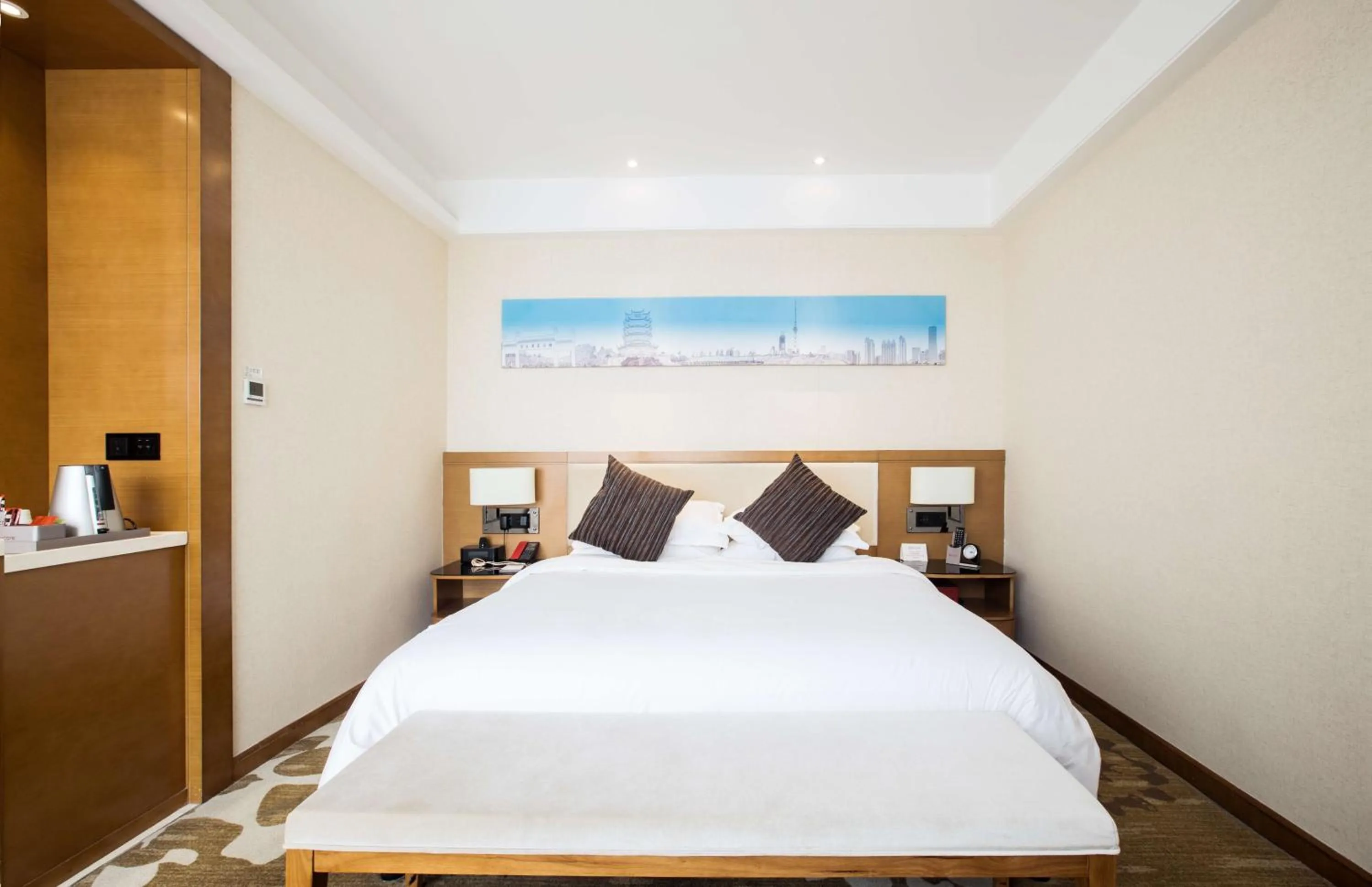 Bed in Ramada Encore Wuhan