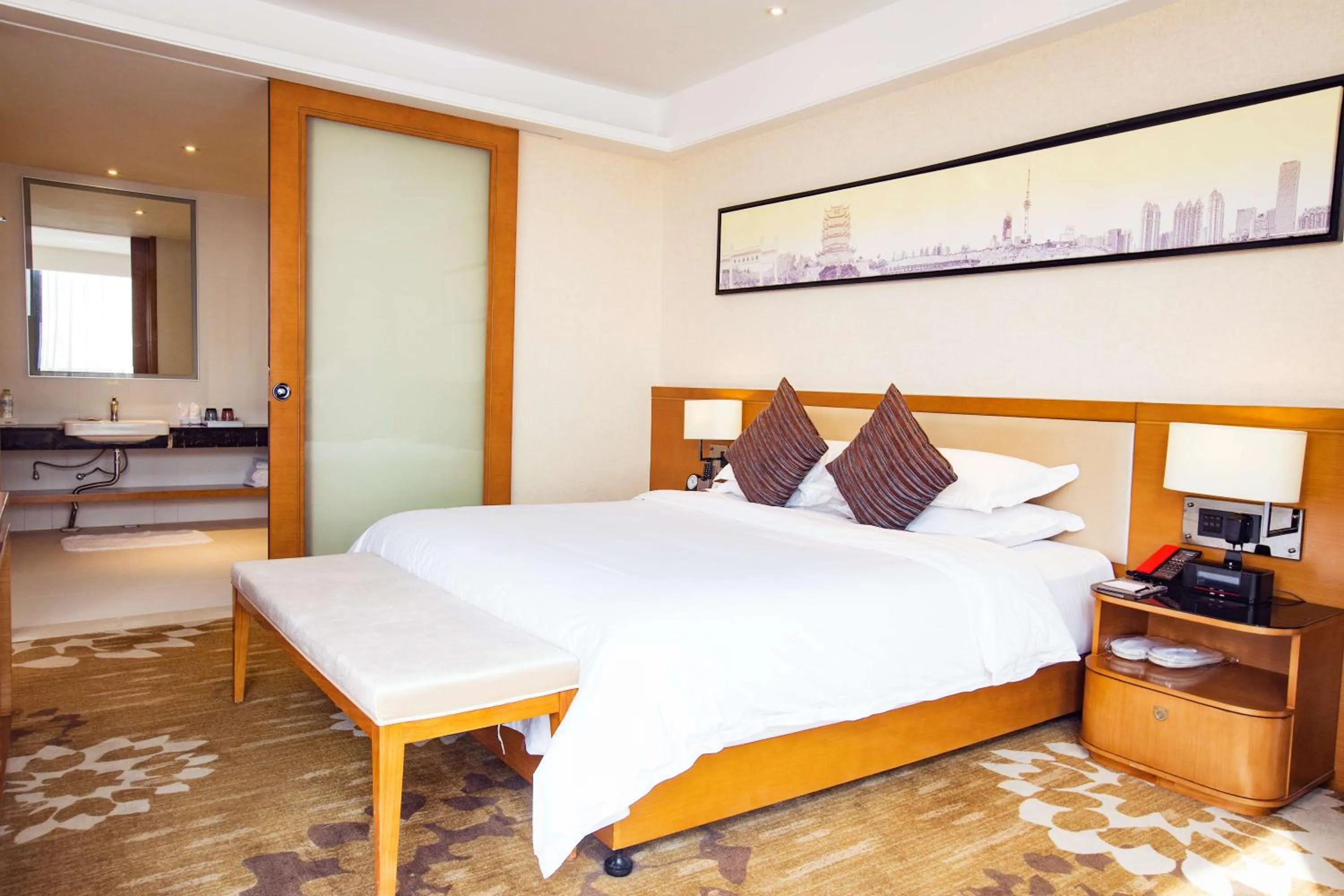 Bed in Ramada Encore Wuhan