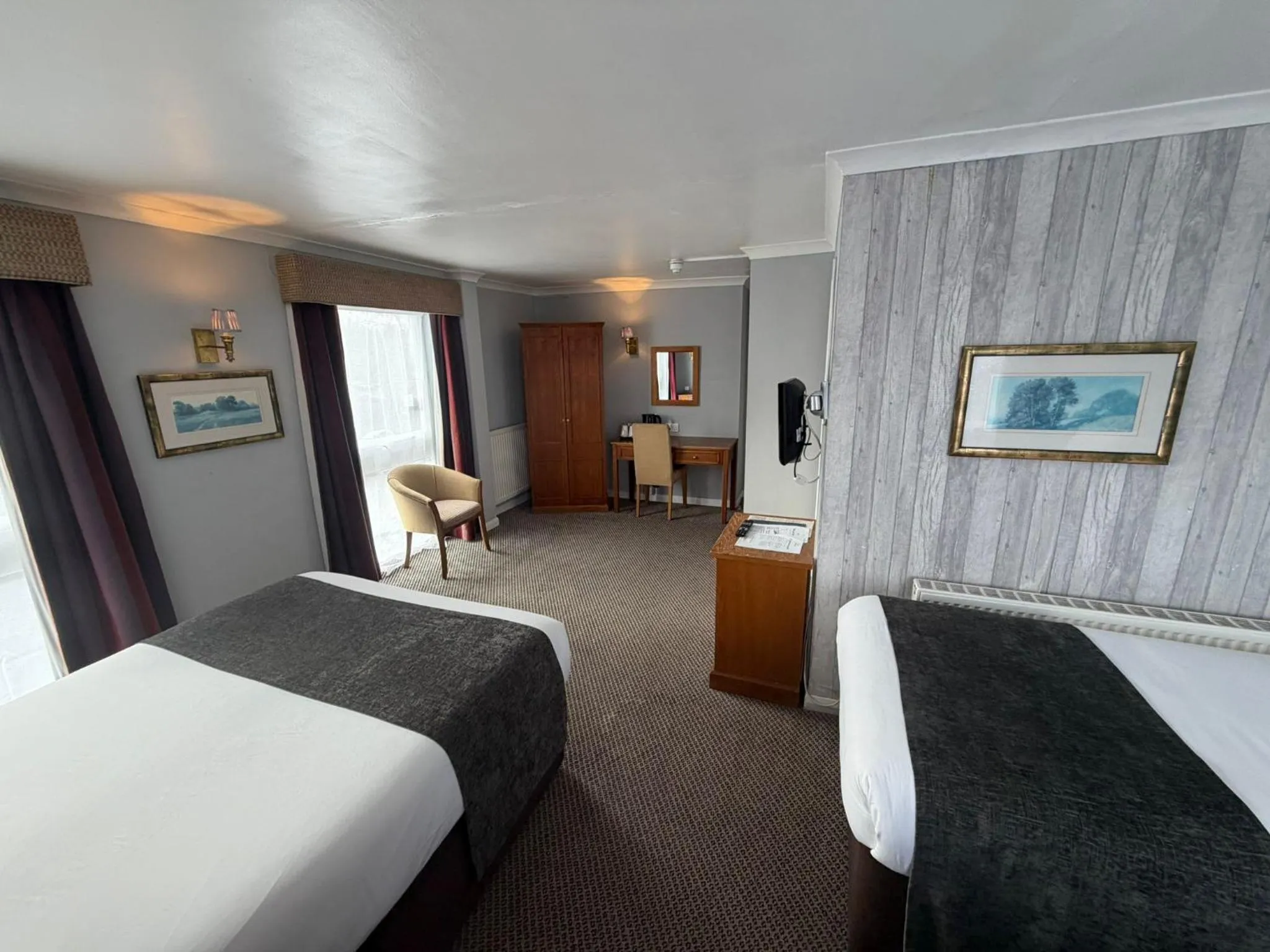 Bed in Raven Hotel by Greene King Inns