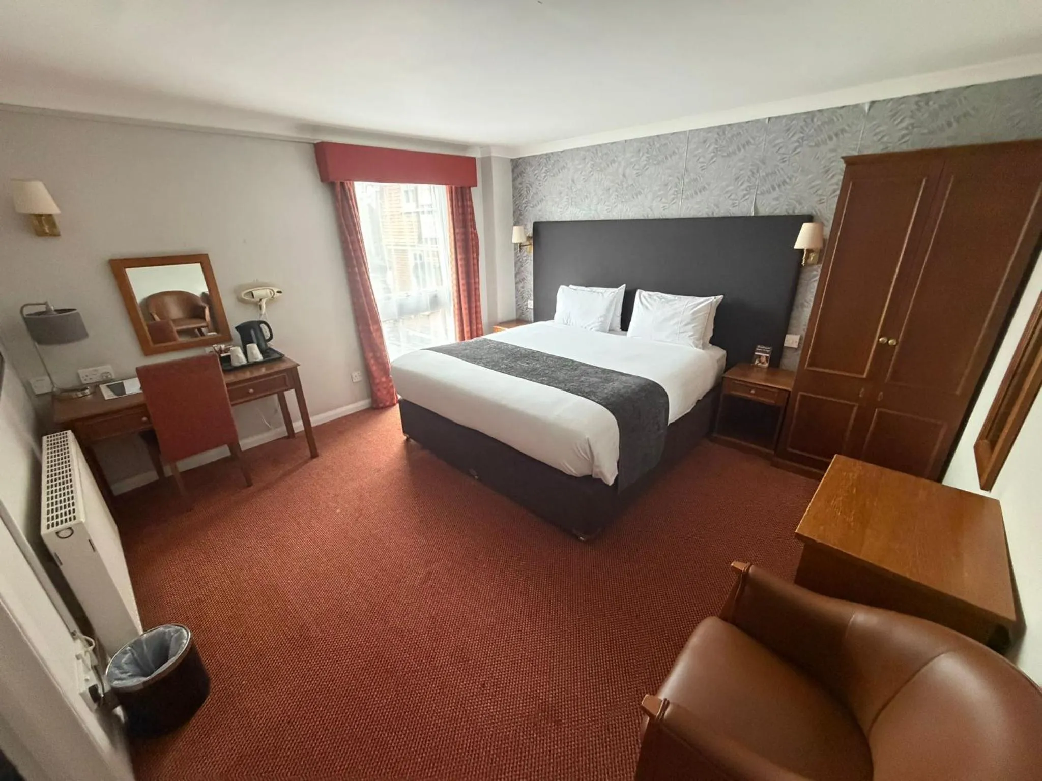 Bed in Raven Hotel by Greene King Inns