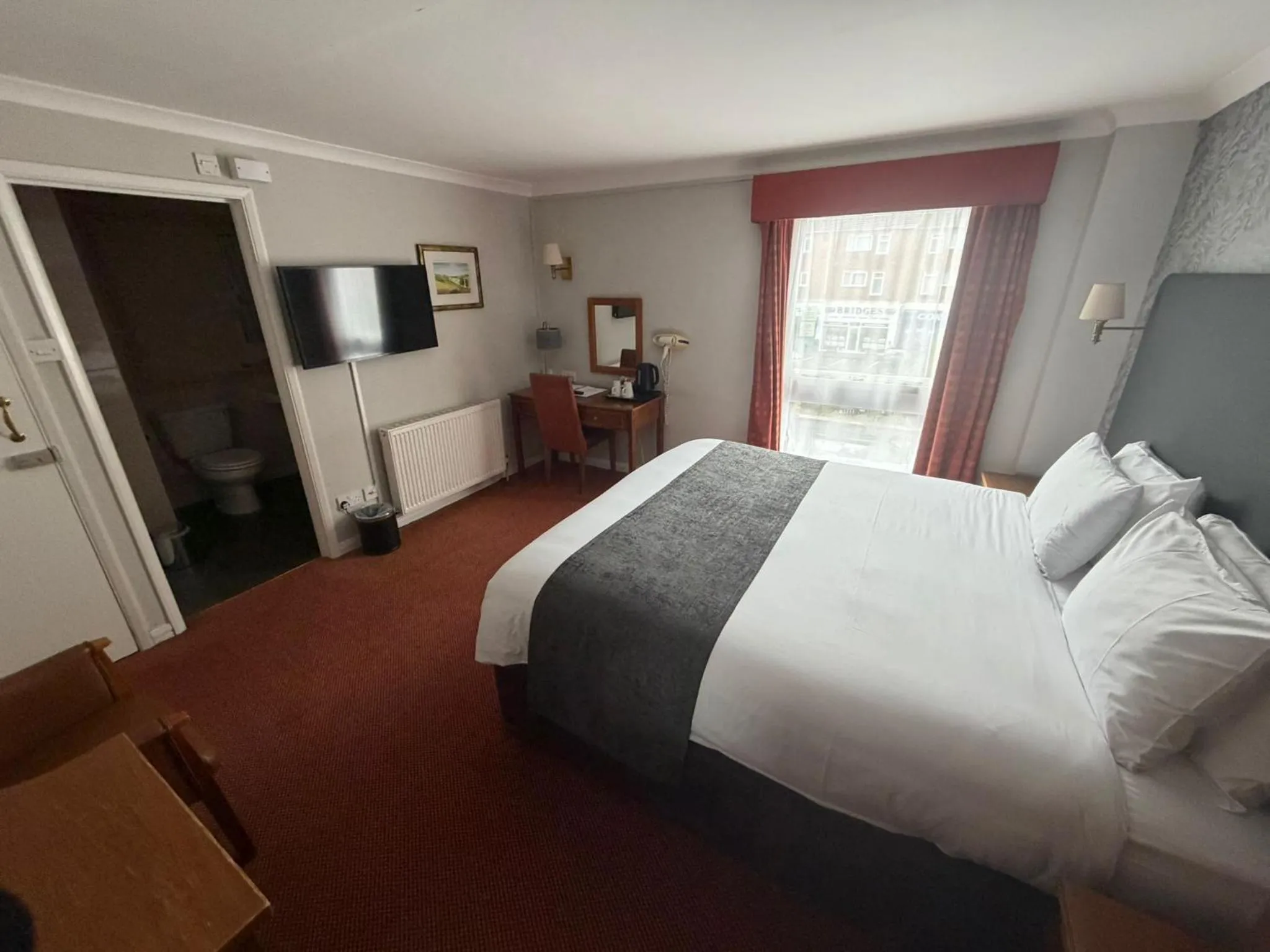 Bed in Raven Hotel by Greene King Inns