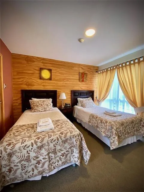 Bed in Madero Aysen ApartHotel