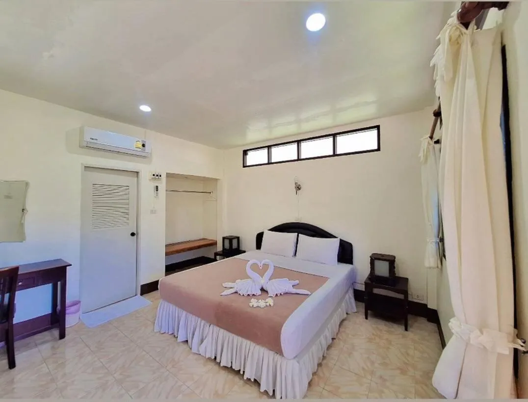 Bed in Koh Mook Rubber Tree Bungalows