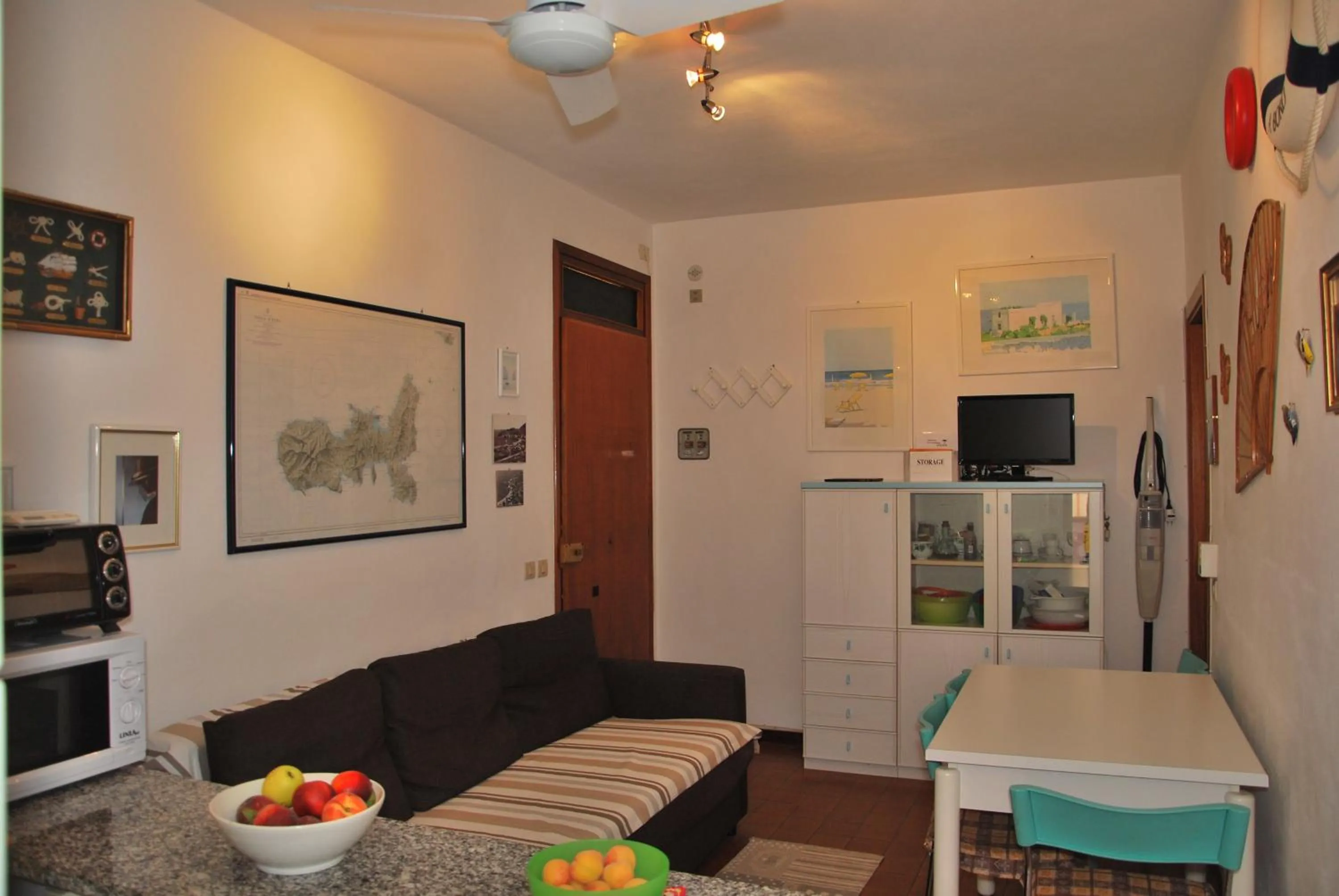 Living room in Appartamenti Camelia e Gabry - Zona mare con posti auto e terrazze