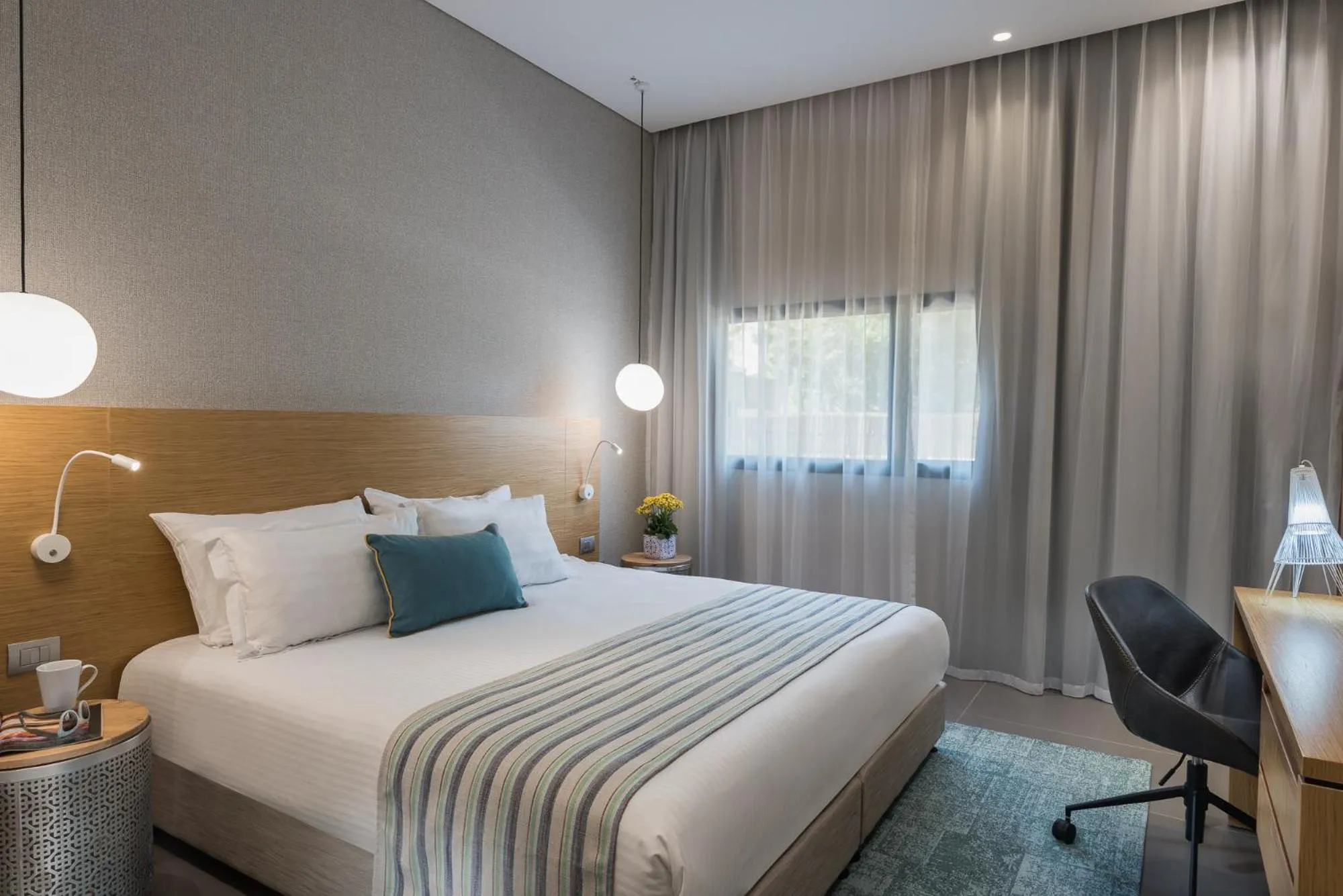 Bedroom, Bed in Oasis Spa Club Dead Sea Hotel - 18 years Plus