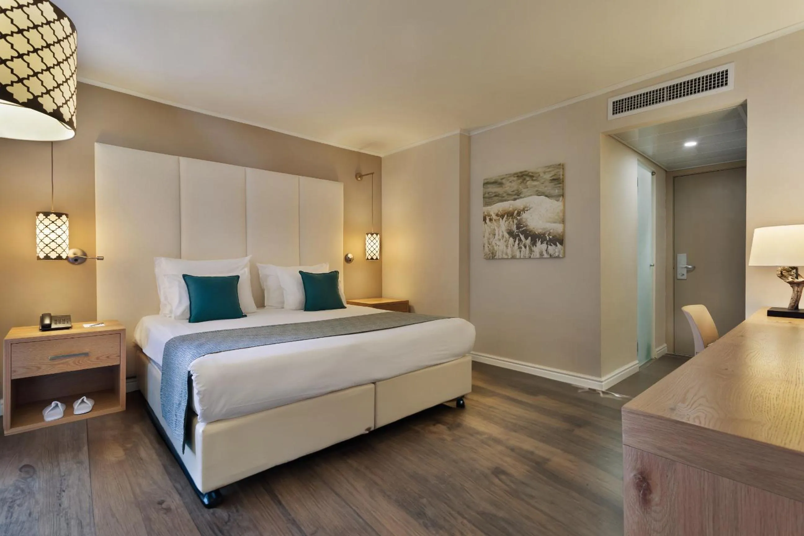 Bedroom, Bed in Oasis Spa Club Dead Sea Hotel - 18 years Plus